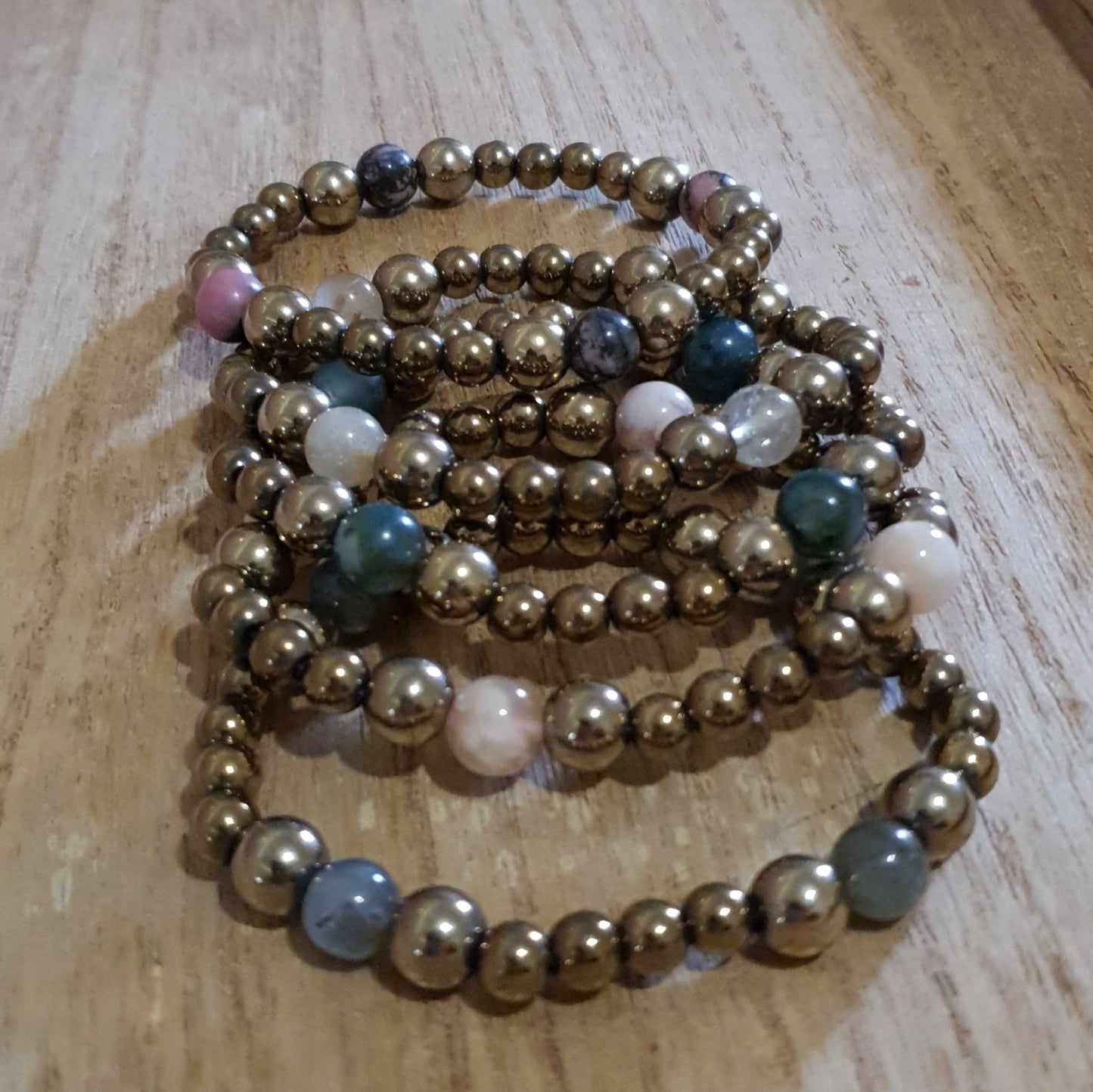 Electroplated Gold Hematite Bracelets. Available in Assorted Materials.