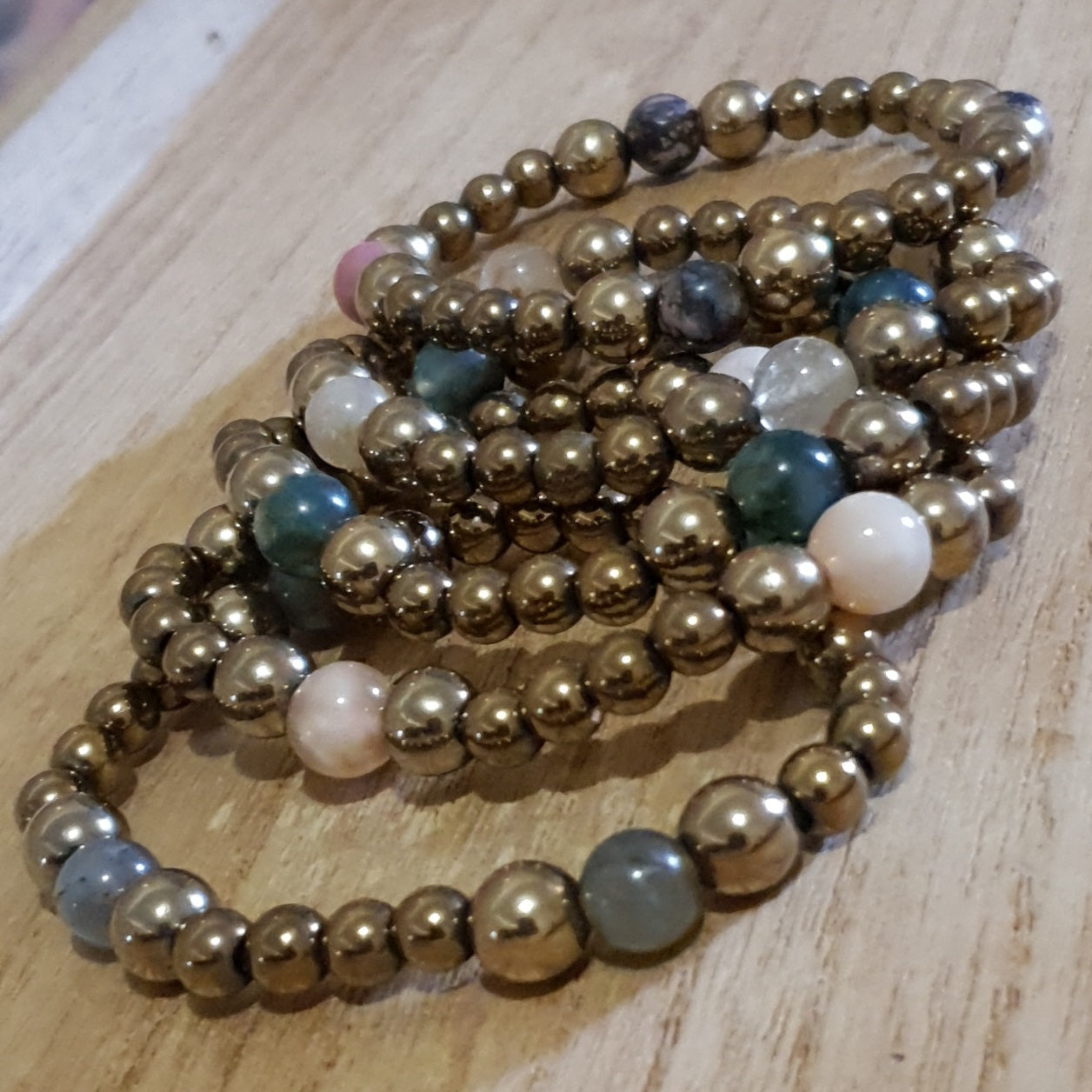 Electroplated Gold Hematite Bracelets. Available in Assorted Materials.