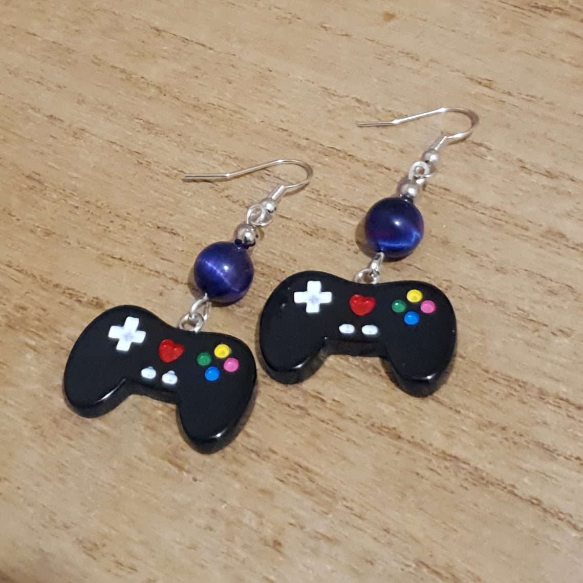 I love Gaming Earrings. Galaxy Tiger Eye Gamer Earrings.