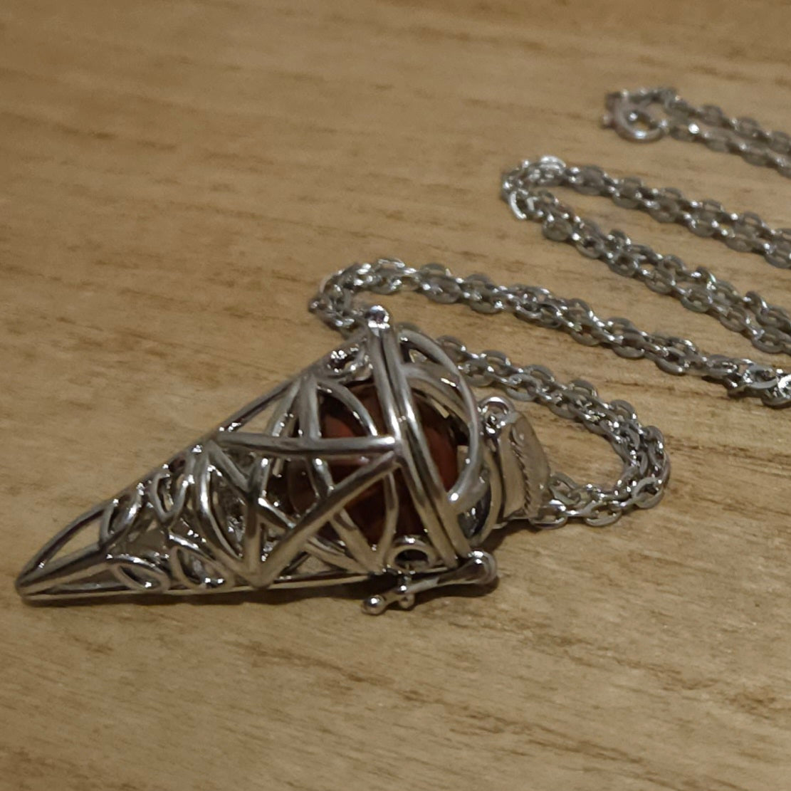 Pentagram Cone Shaped Cage with Red Jasper Sphere.