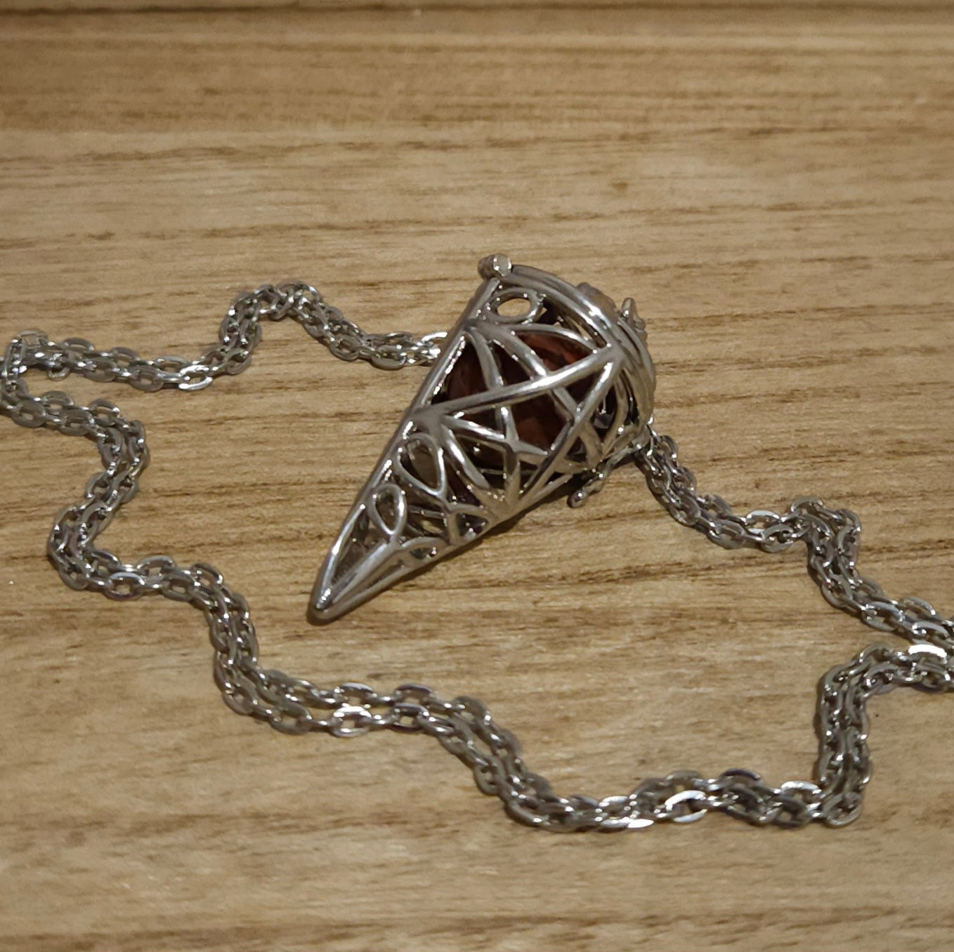 Pentagram Cone Shaped Cage with Red Jasper Sphere.