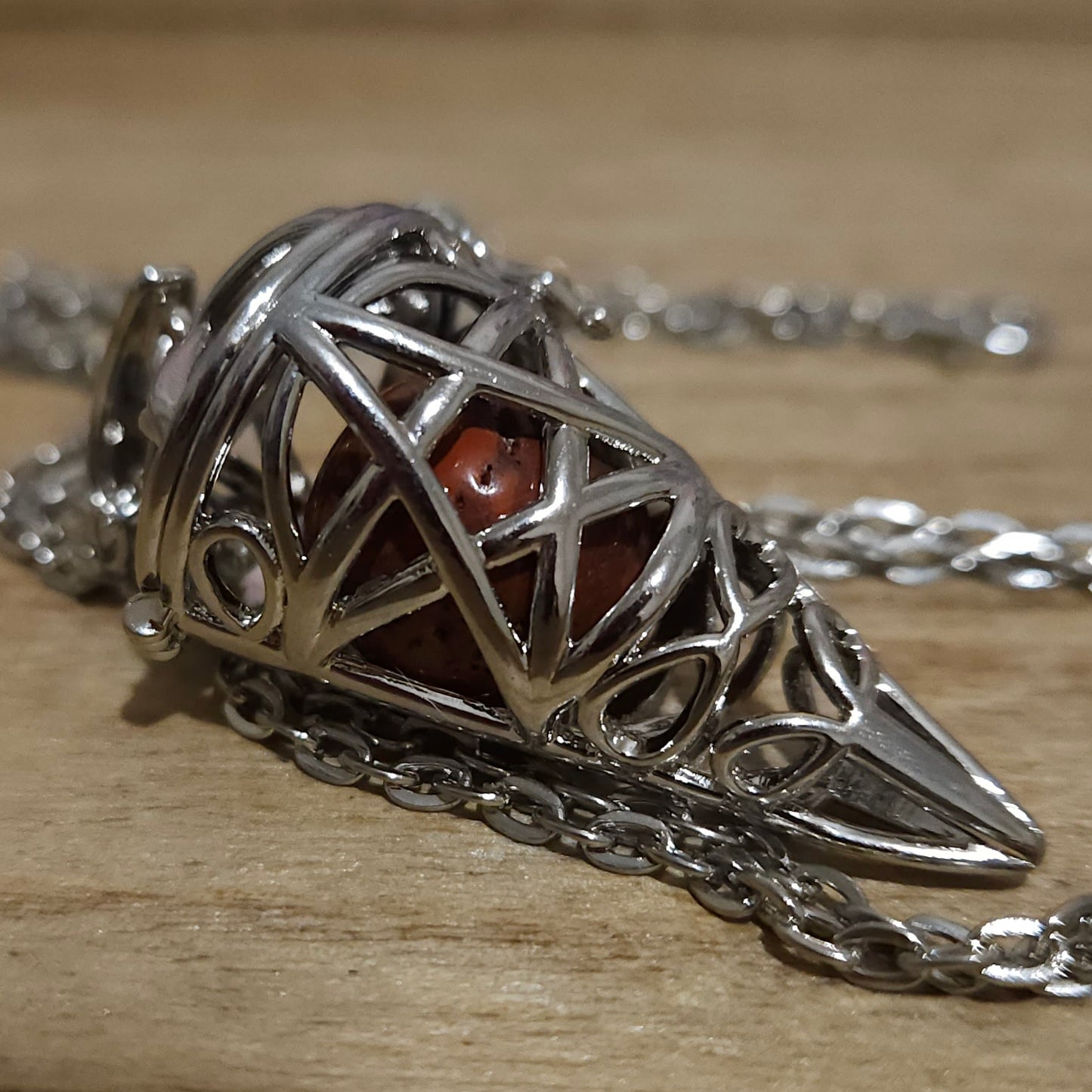 Pentagram Cone Shaped Cage with Red Jasper Sphere.