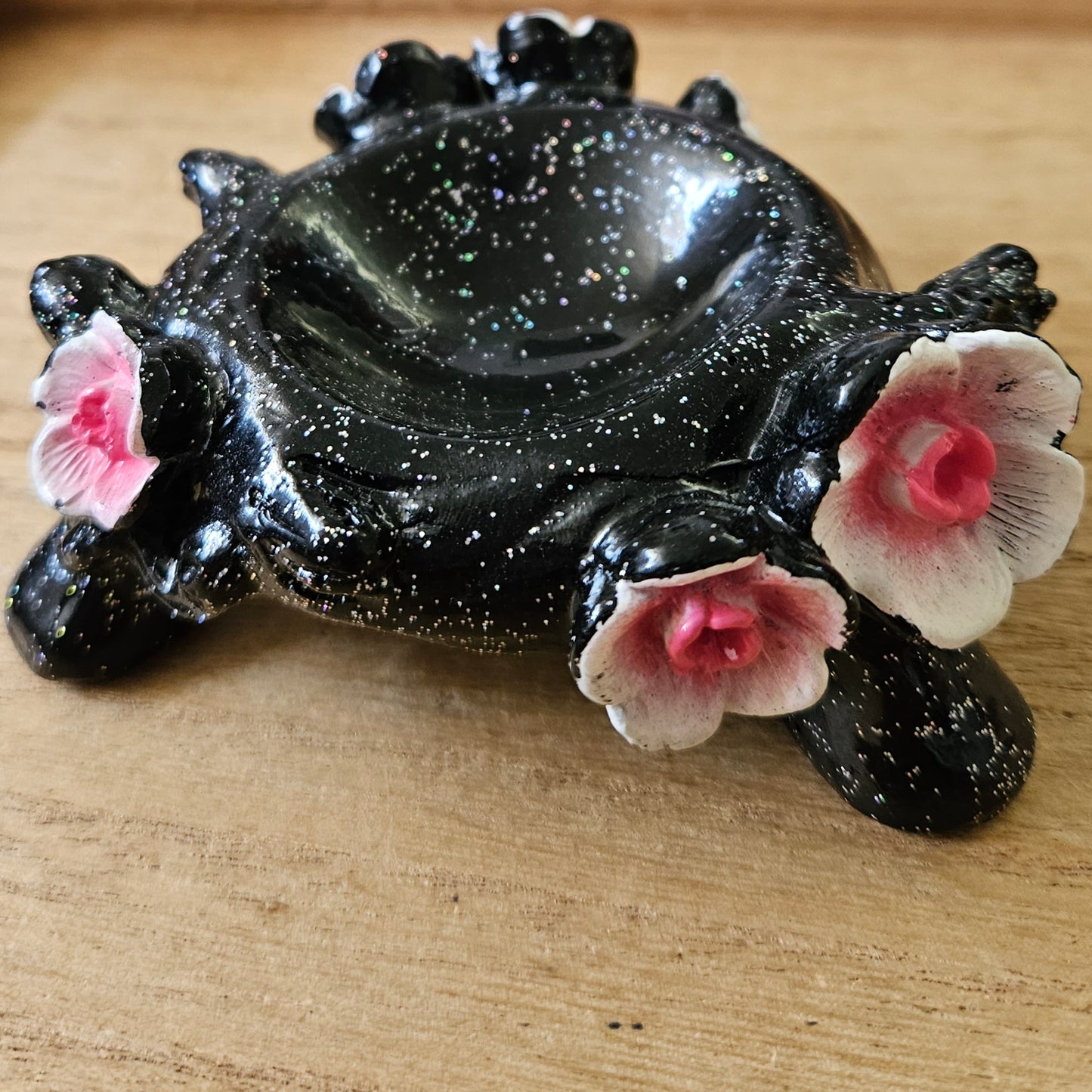 Black Holder with Pink Cherry Blossoms.