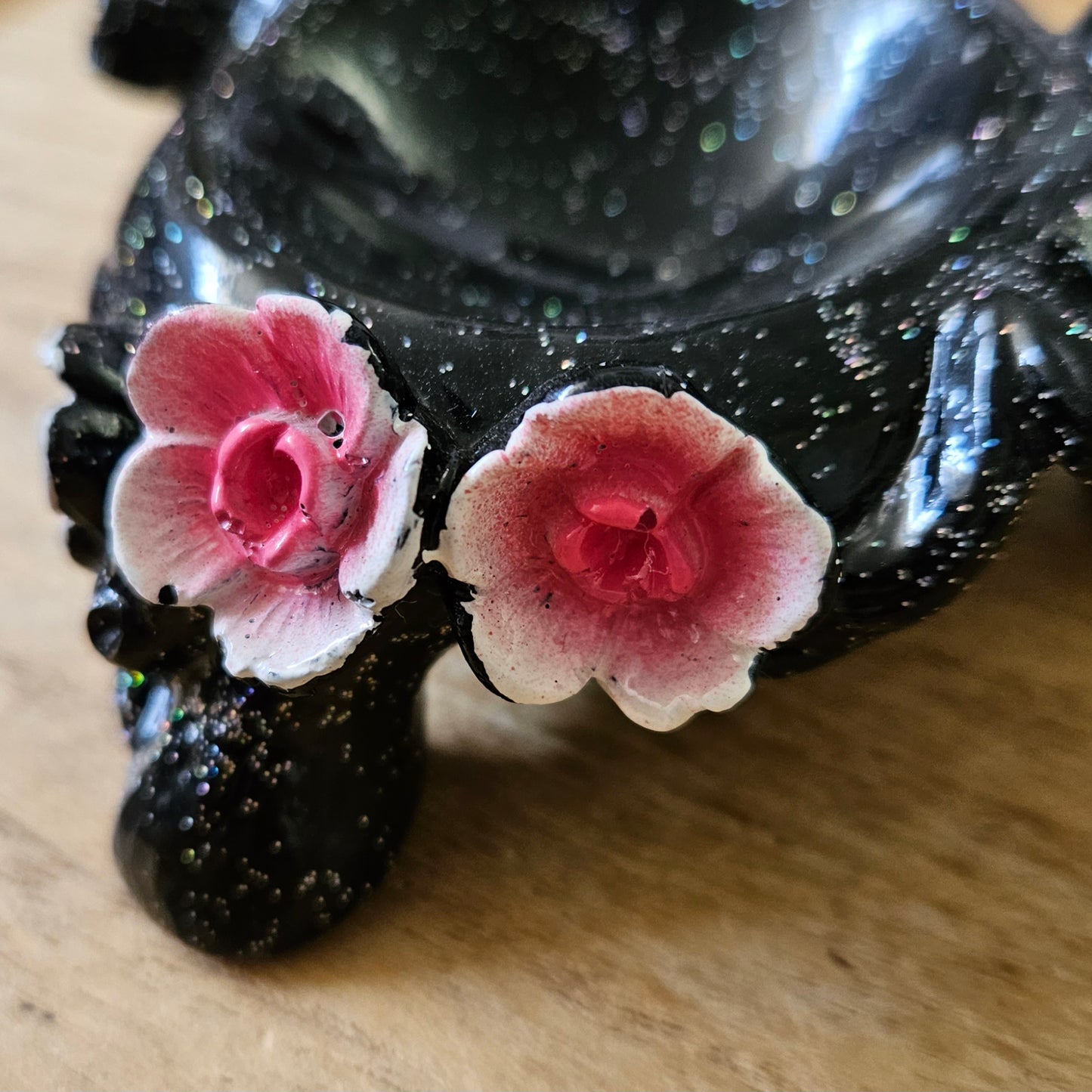 Black Holder with Pink Cherry Blossoms.