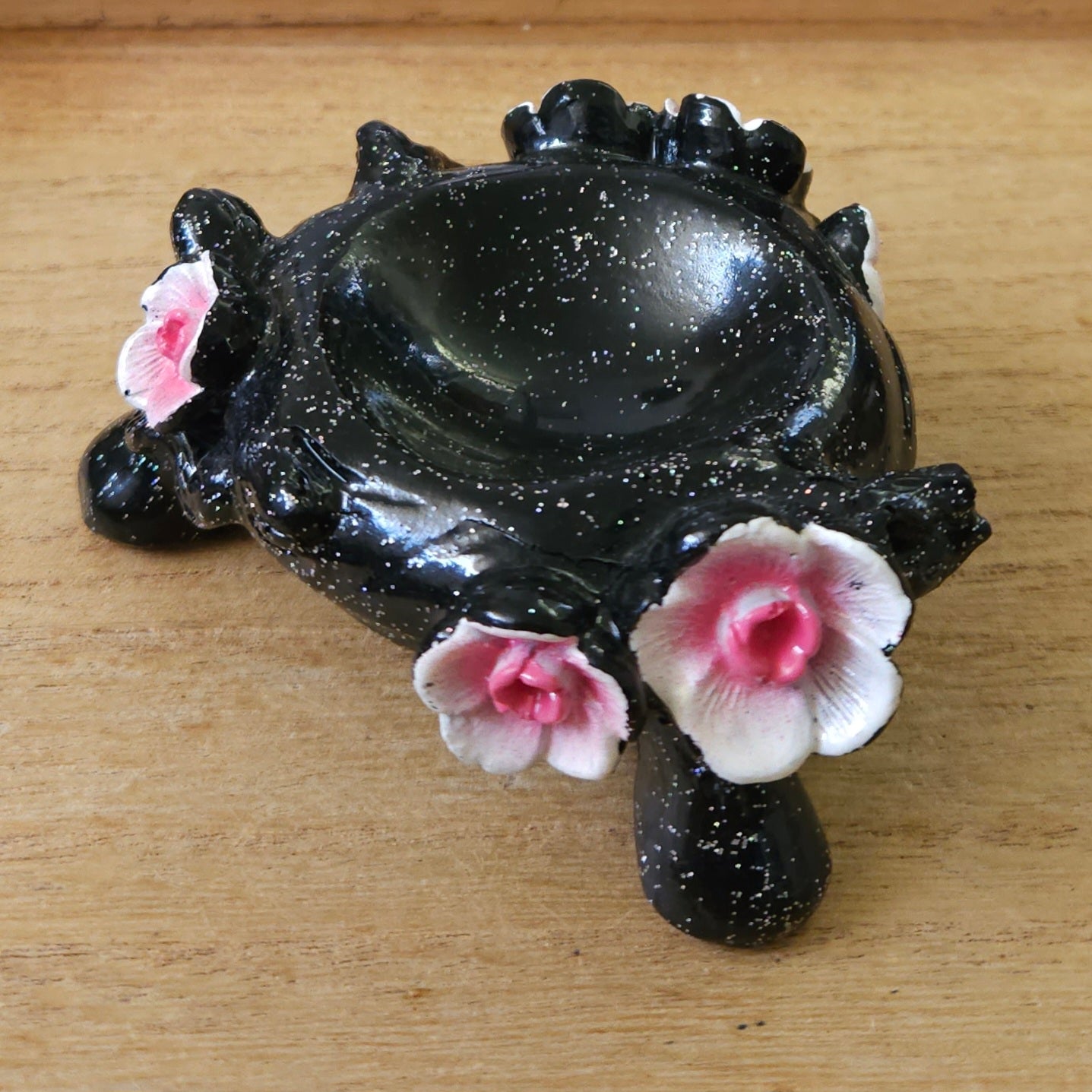 Black Holder with Pink Cherry Blossoms.