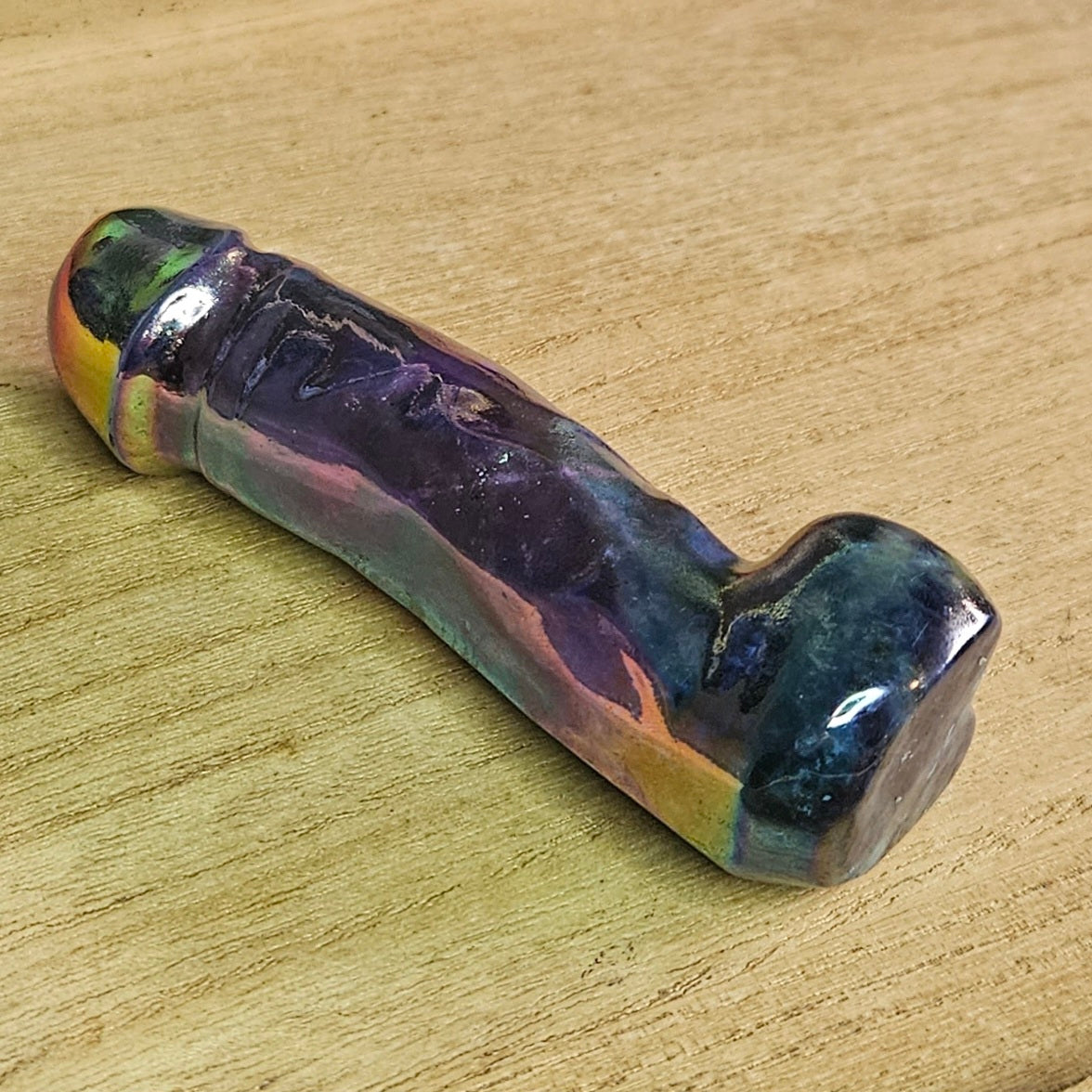 Aura Coated Sodalite Dick Carving.