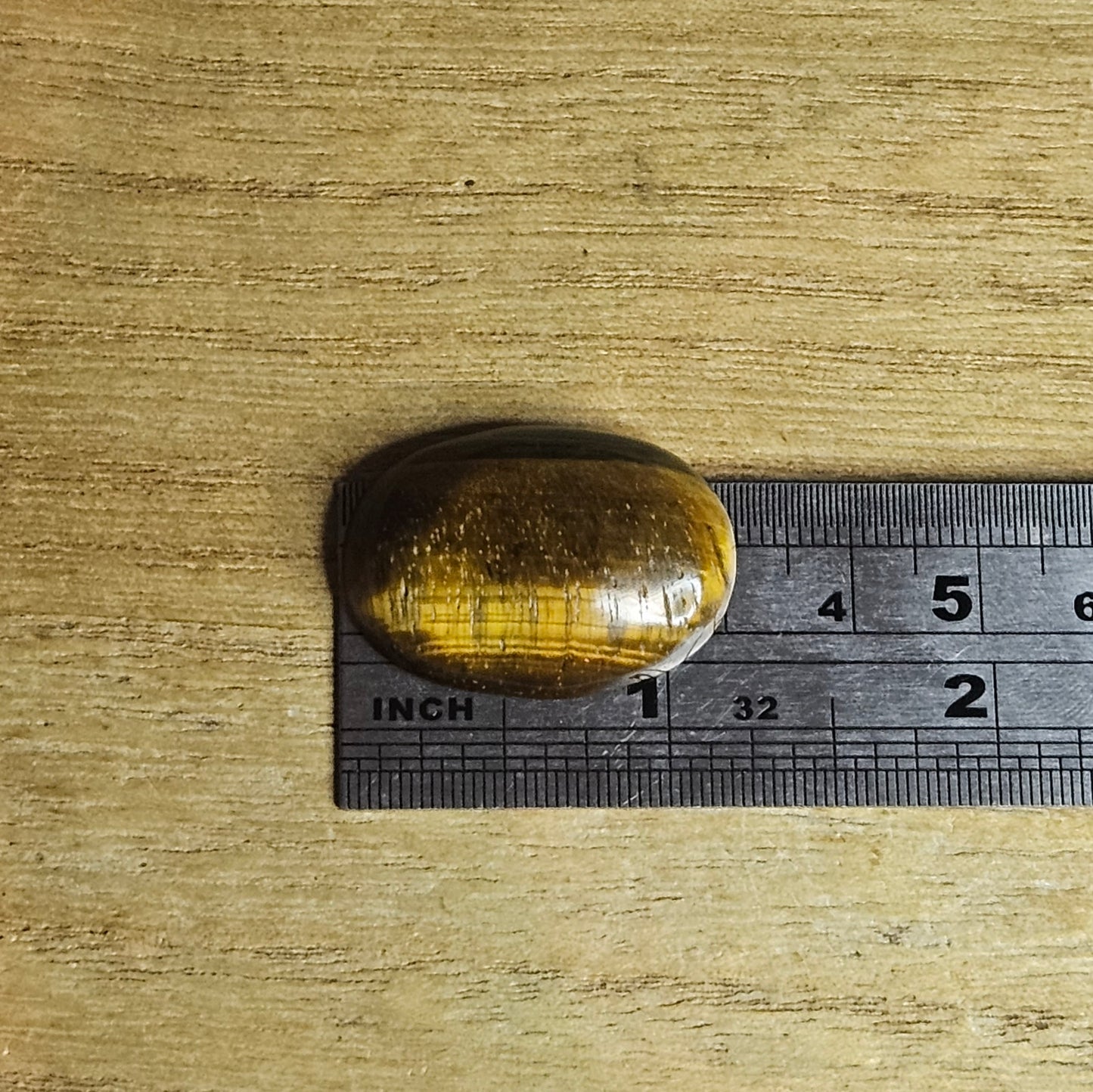 Tiger's Eye Oval Cabochon.