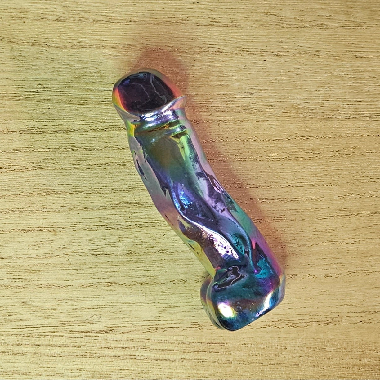 Aura Coated Sodalite Dick Carving.