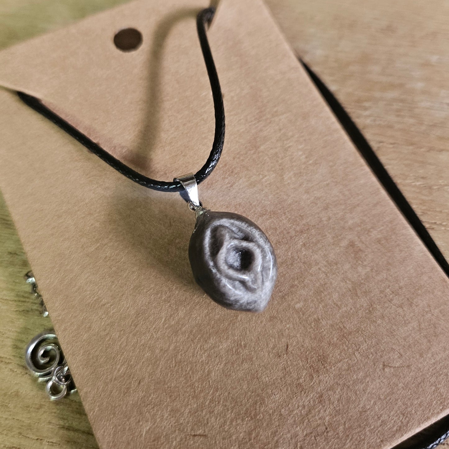 Silver Sheen Obsidian Vagina Necklace.
