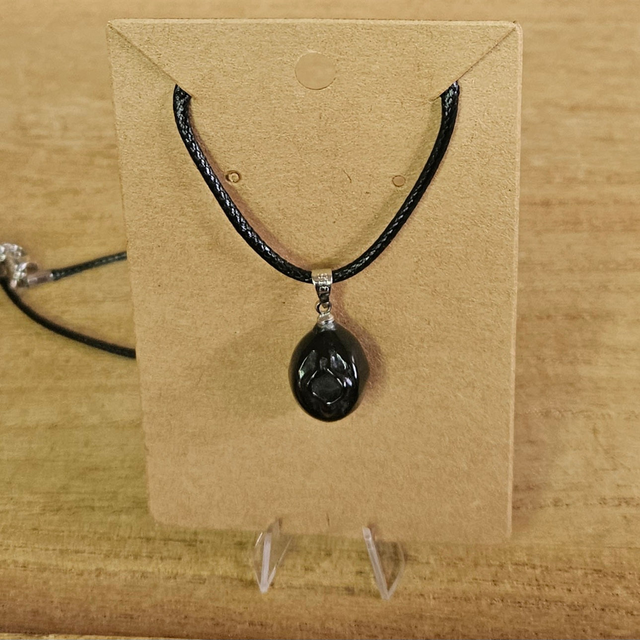 Obsidian Vagina Necklace.