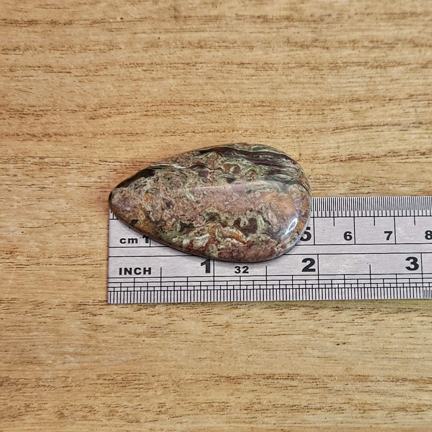 Rainforest Rhyolite Tear-drop Cabochon.