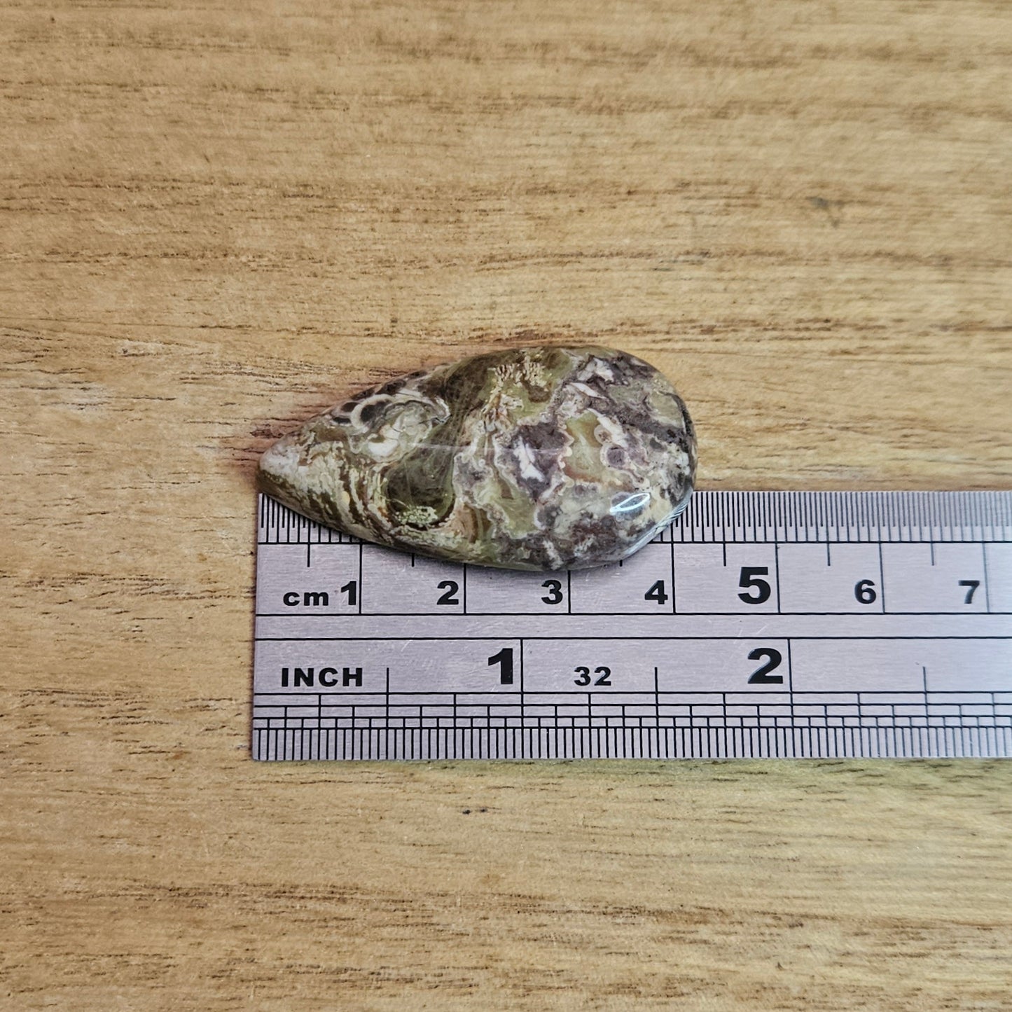 Rainforest Rhyolite Tear-drop Cabochon.