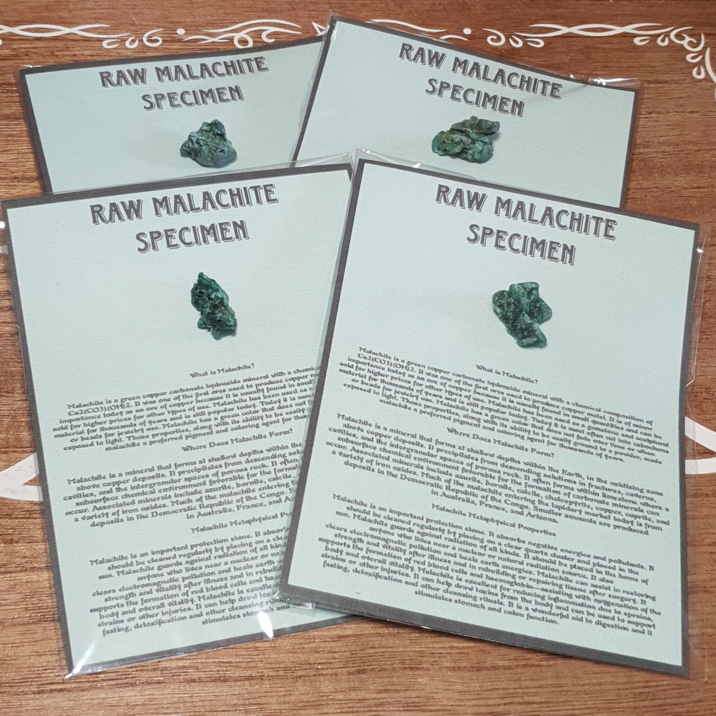 Raw Malachite Specimen and Information sheet.