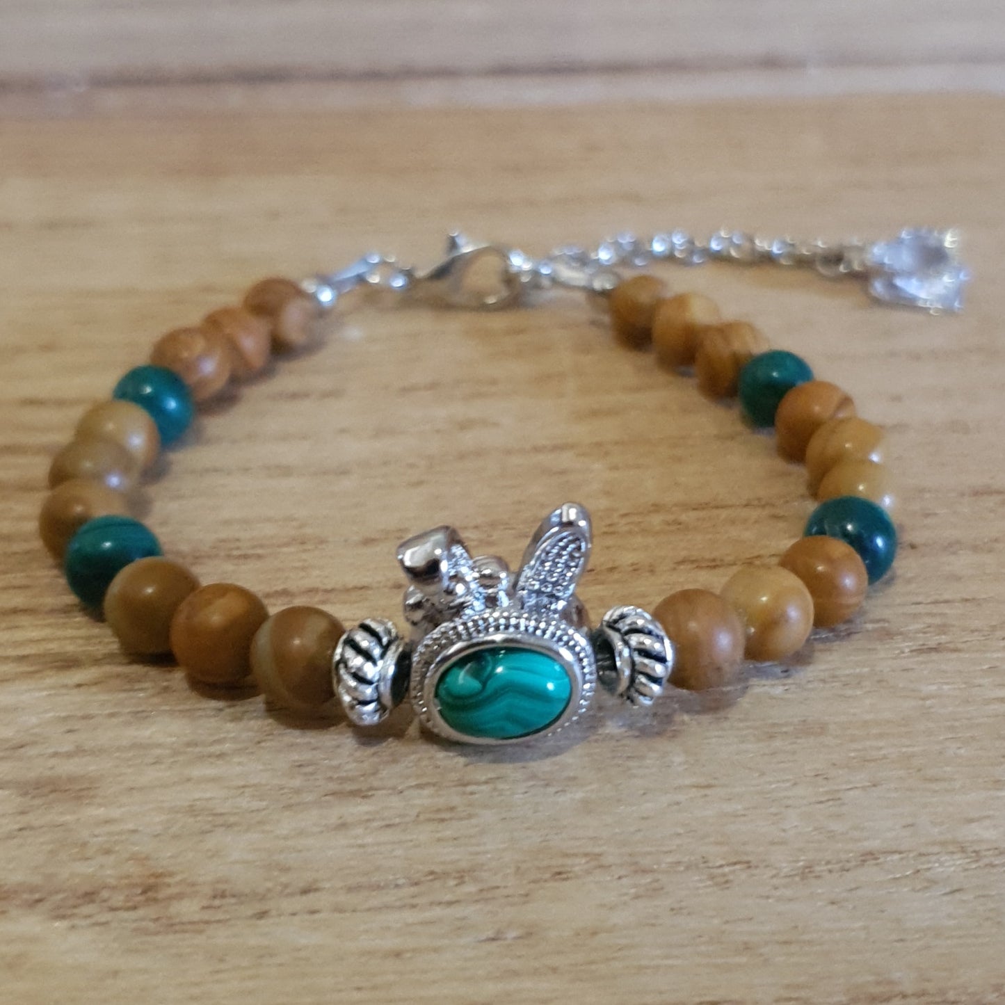 Malachite Bunny Charm. Malachite and Petrified Wood Handmade Bracelet.