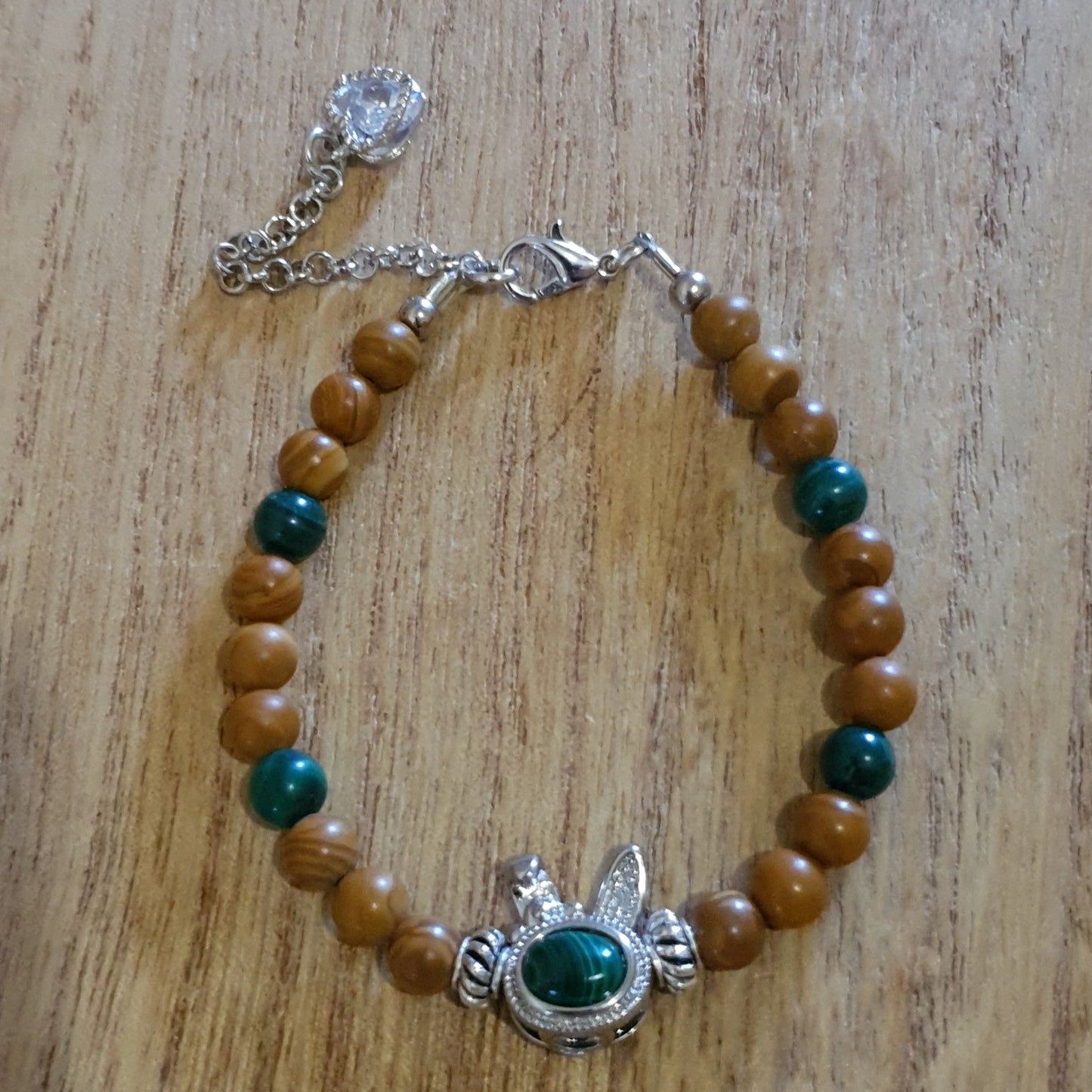 Malachite Bunny Charm. Malachite and Petrified Wood Handmade Bracelet.