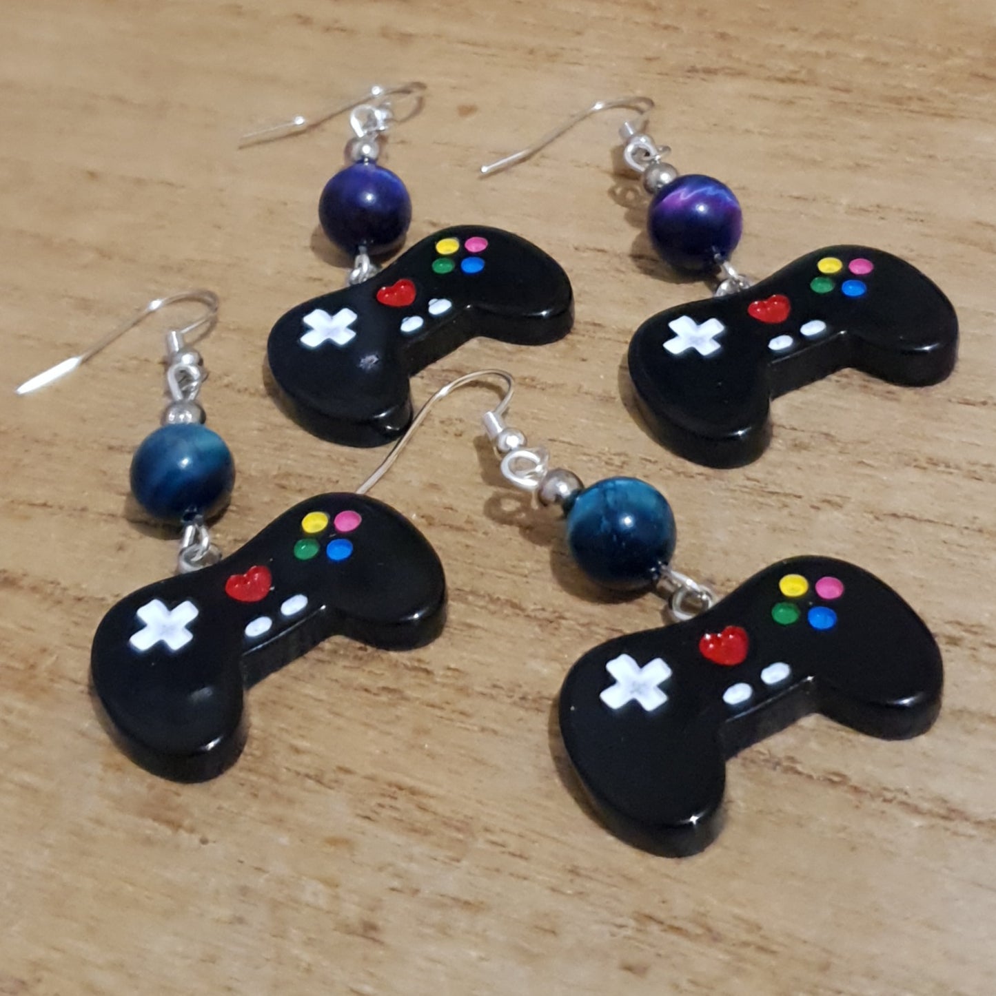 I love Gaming Earrings. Galaxy Tiger Eye Gamer Earrings.