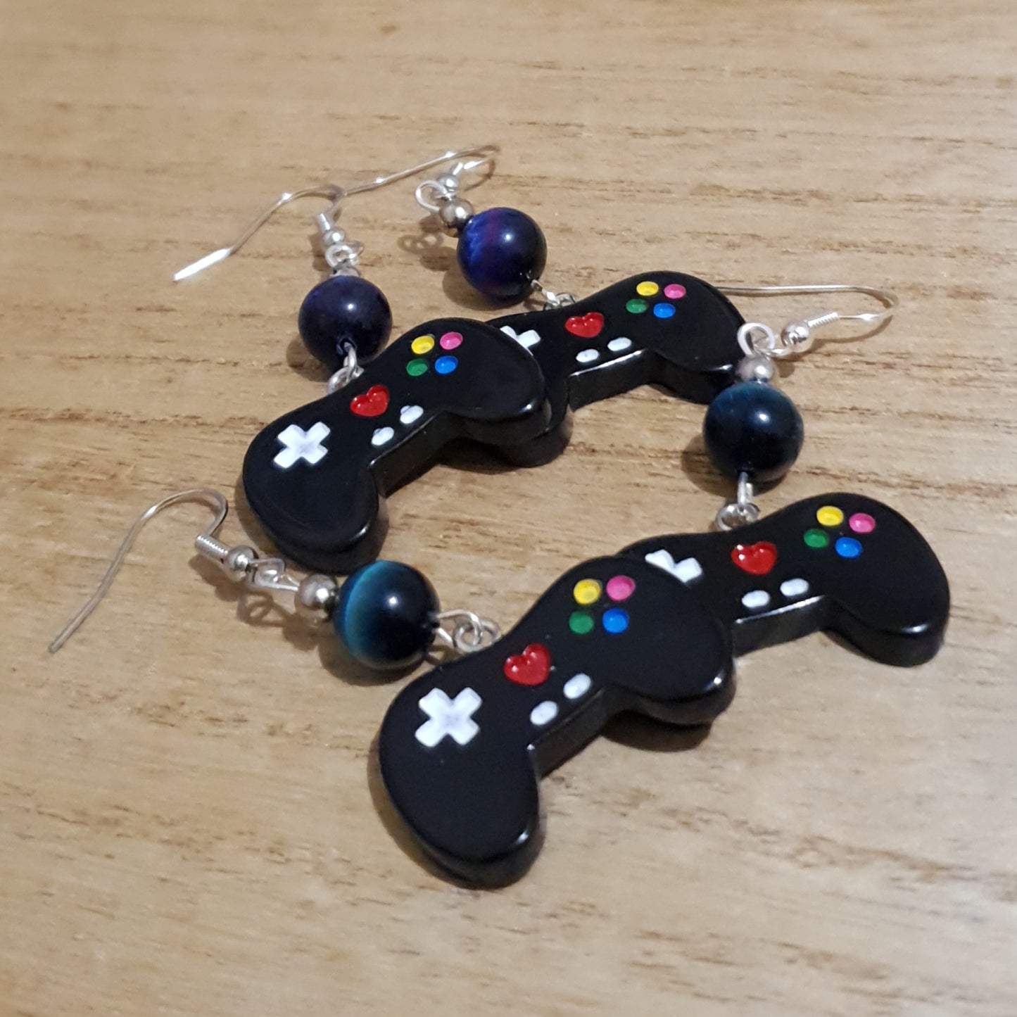 I love Gaming Earrings. Galaxy Tiger Eye Gamer Earrings.