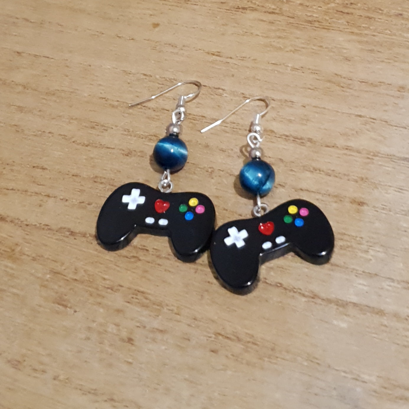 I love Gaming Earrings. Galaxy Tiger Eye Gamer Earrings.