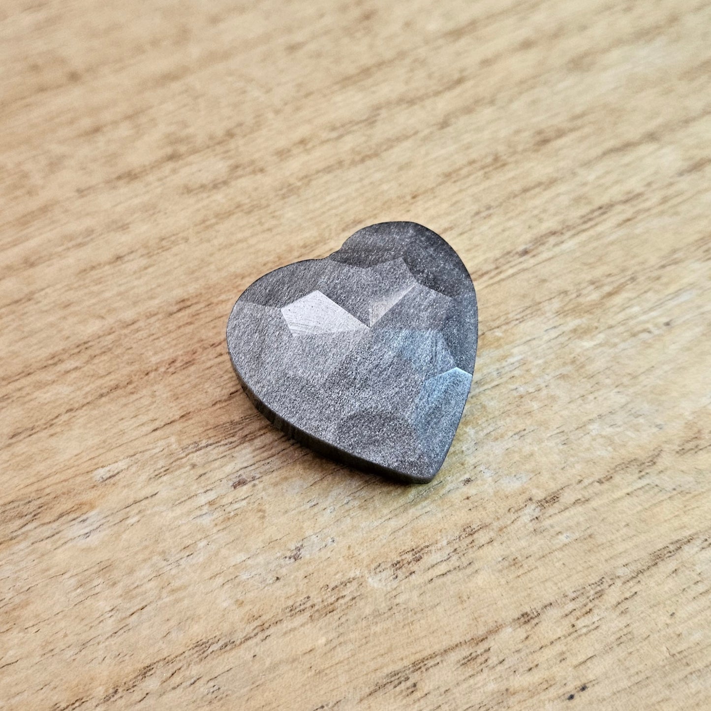 Silver Sheen Obsidian Faceted Heart Carving.