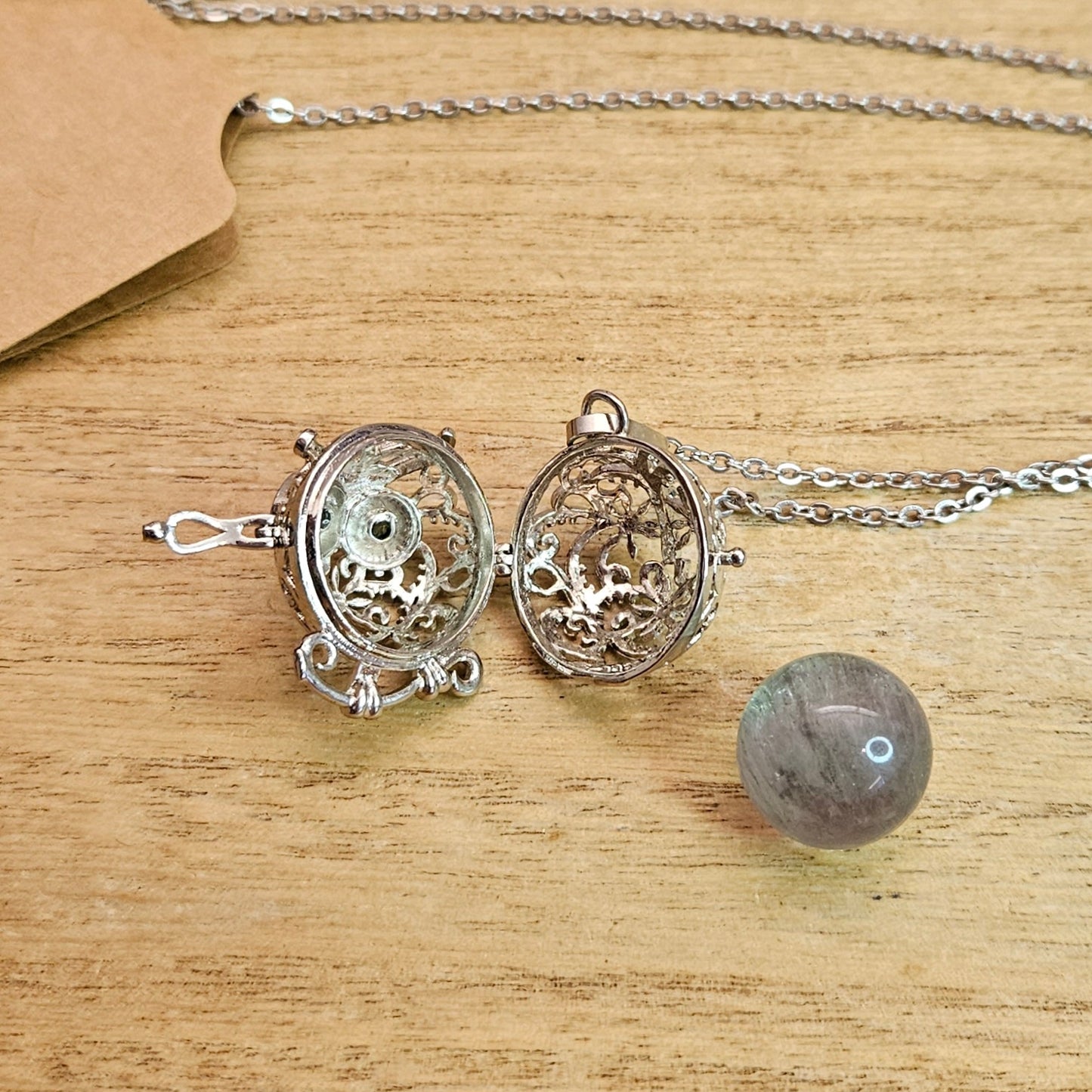 Owl Cage Necklace & Fluorite Sphere.