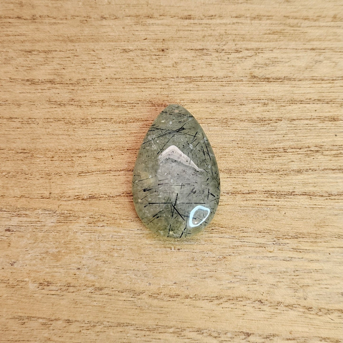 Epidote in Prehnite Tear-drop Cabochon.