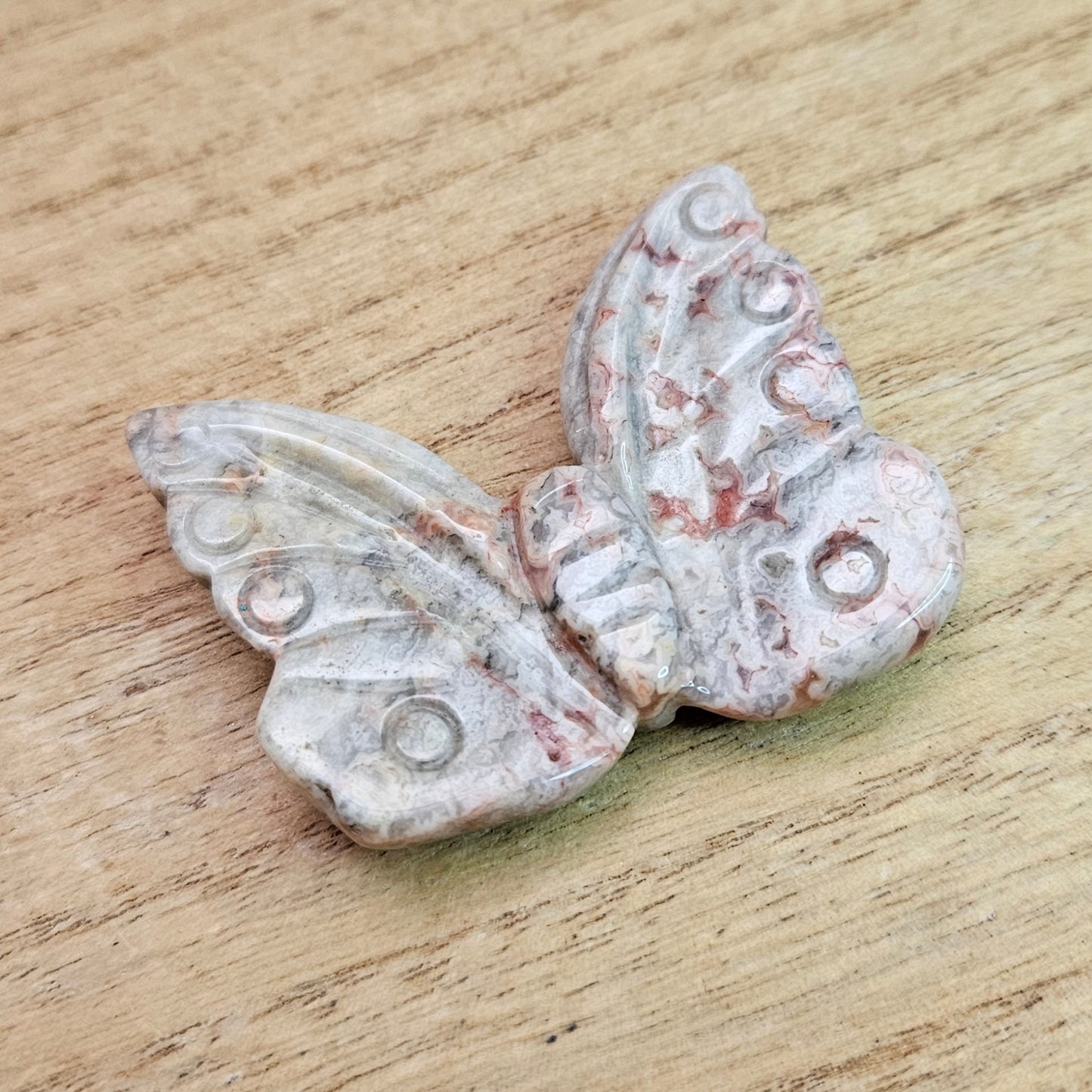 Crazy Lace Agate Butterfly Carving.