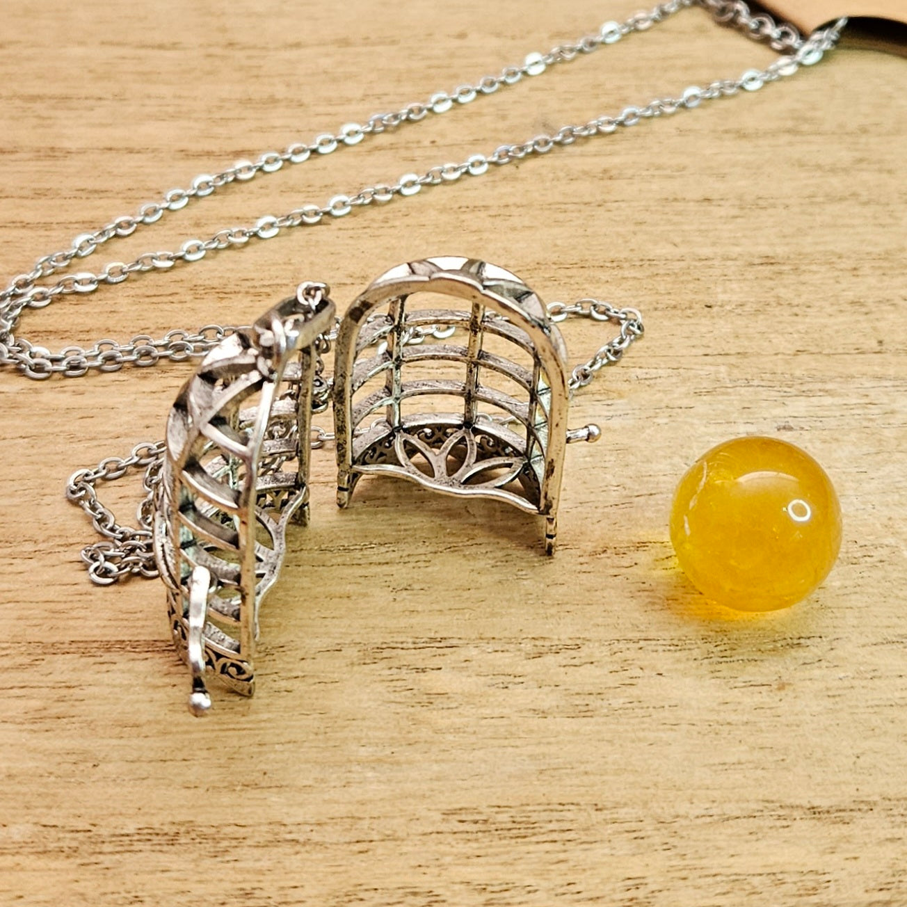 Bird Cage Necklace & Fluorite Sphere.