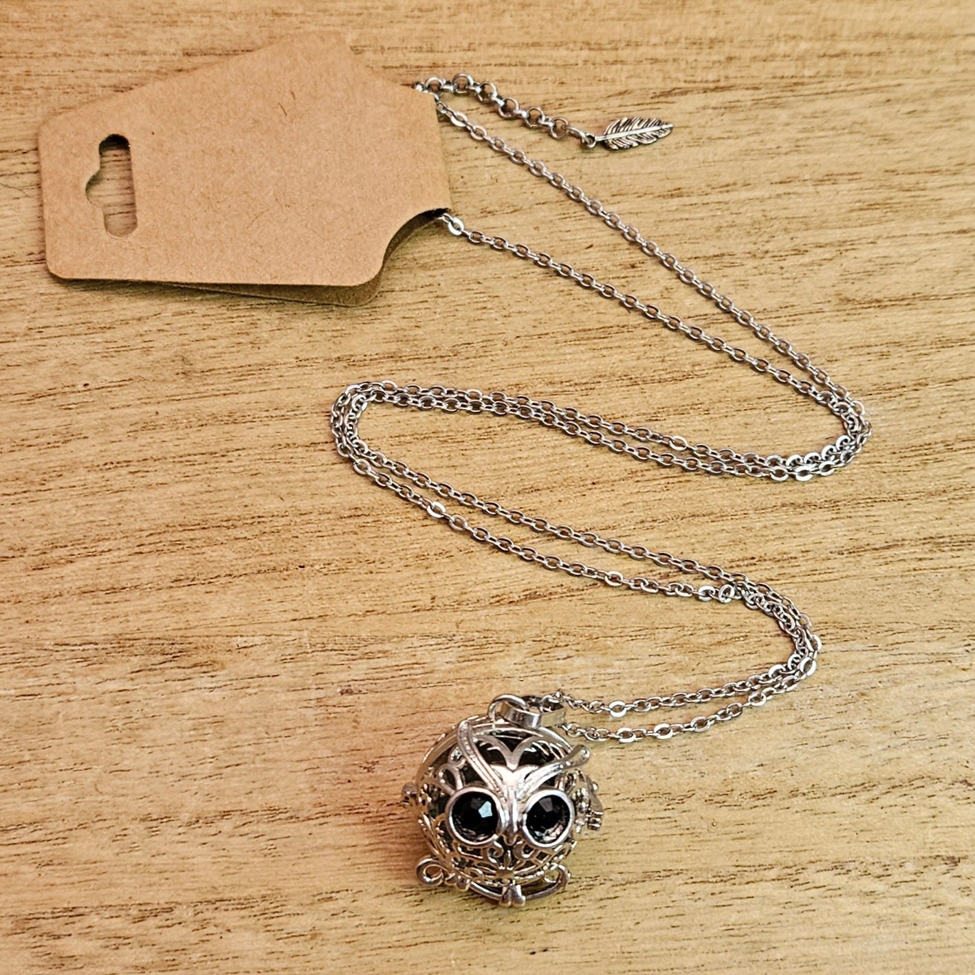 Owl Cage Necklace & Fluorite Sphere.
