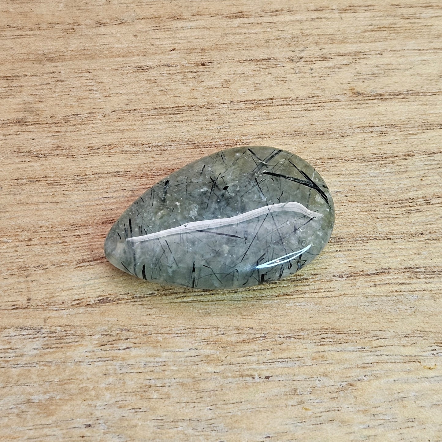 Epidote in Prehnite Tear-drop Cabochon.