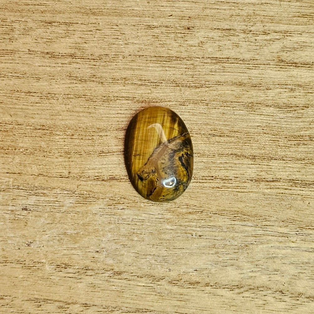 Tiger's Eye Oval Cabochon.