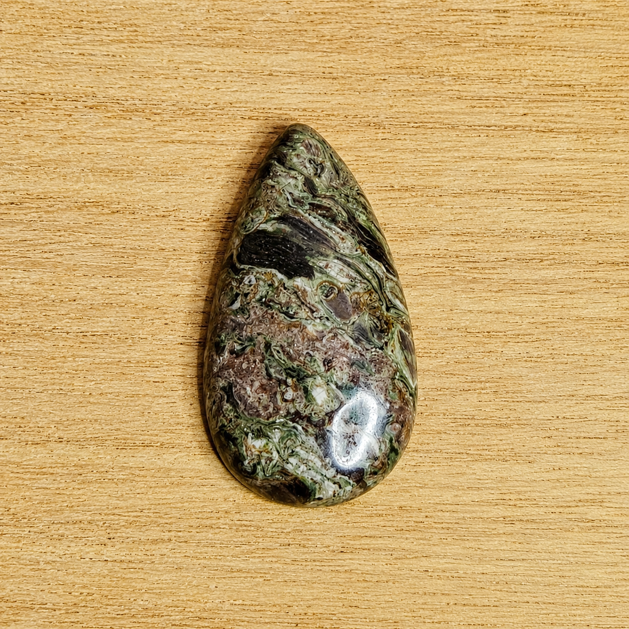 Rainforest Rhyolite Tear-drop Cabochon.