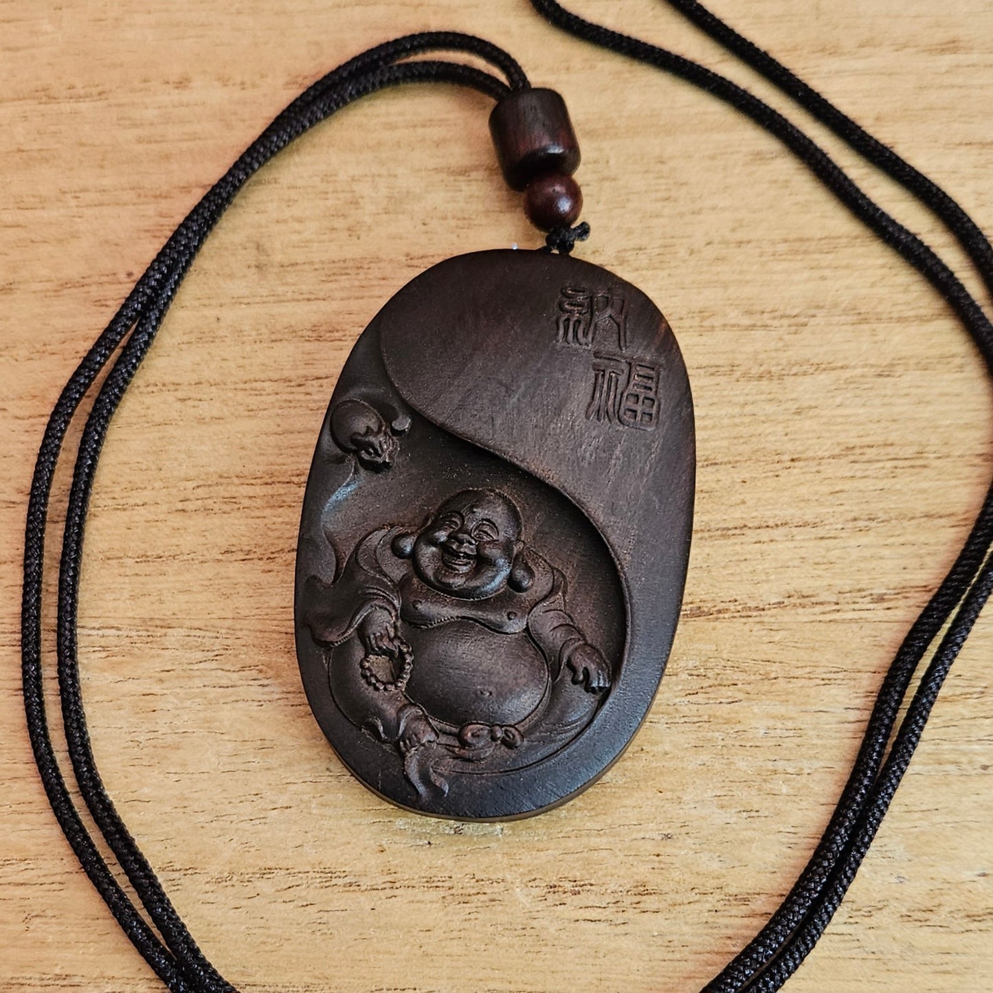 Wooden Buddha Pendant and Cord Necklace.