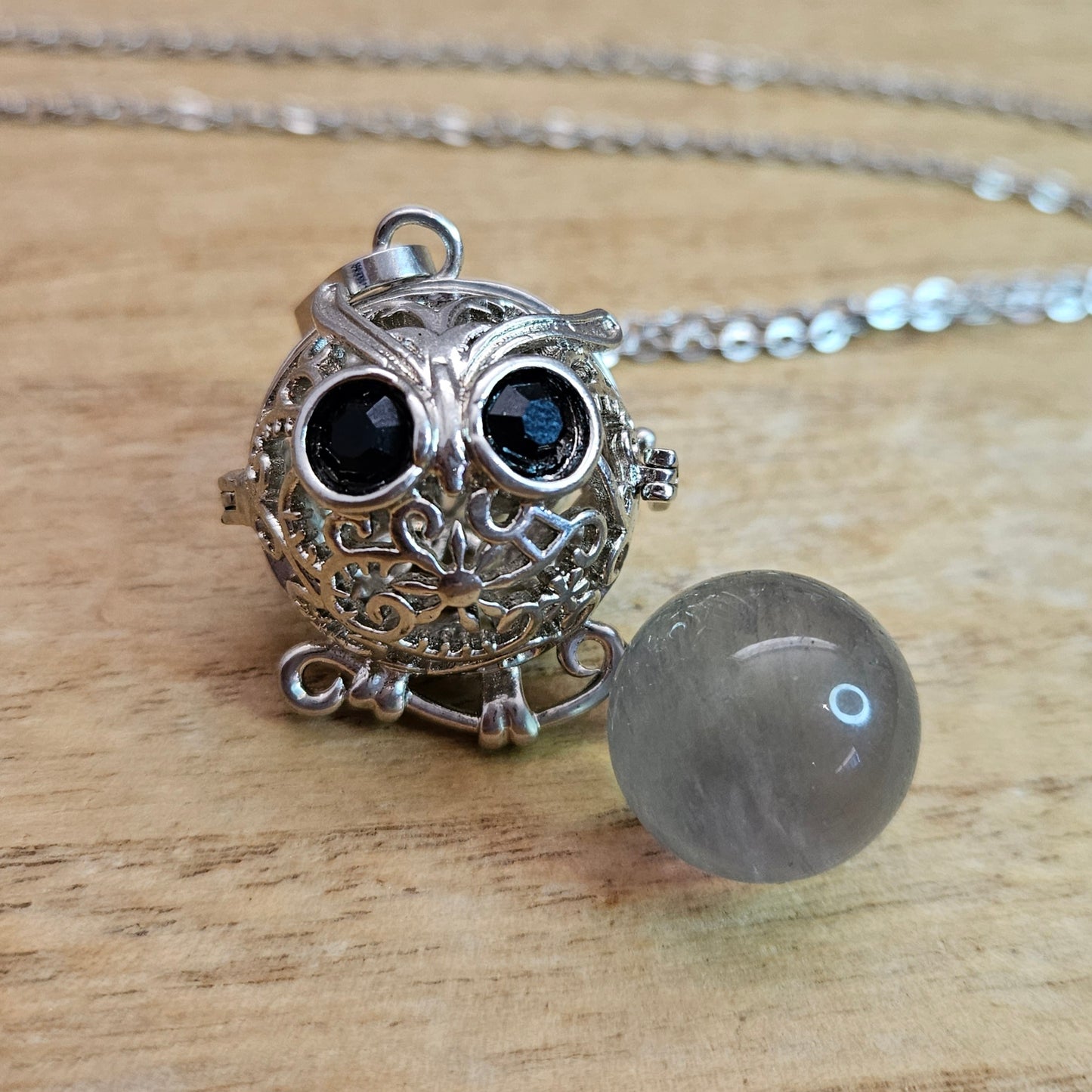 Owl Cage Necklace & Fluorite Sphere.