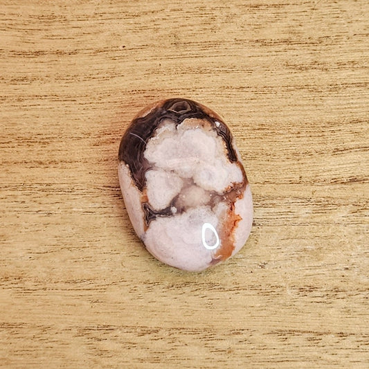 Black Flower Agate Palmstone.