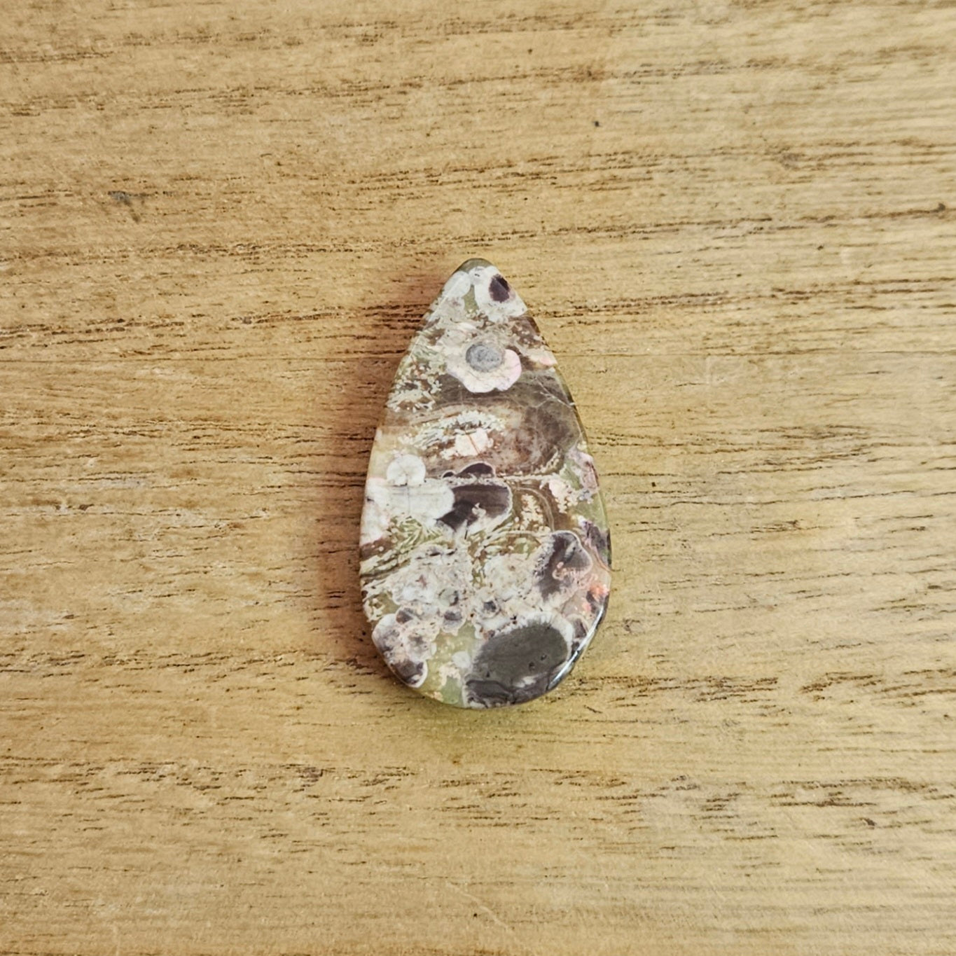 Rainforest Rhyolite Tear-drop Cabochon.
