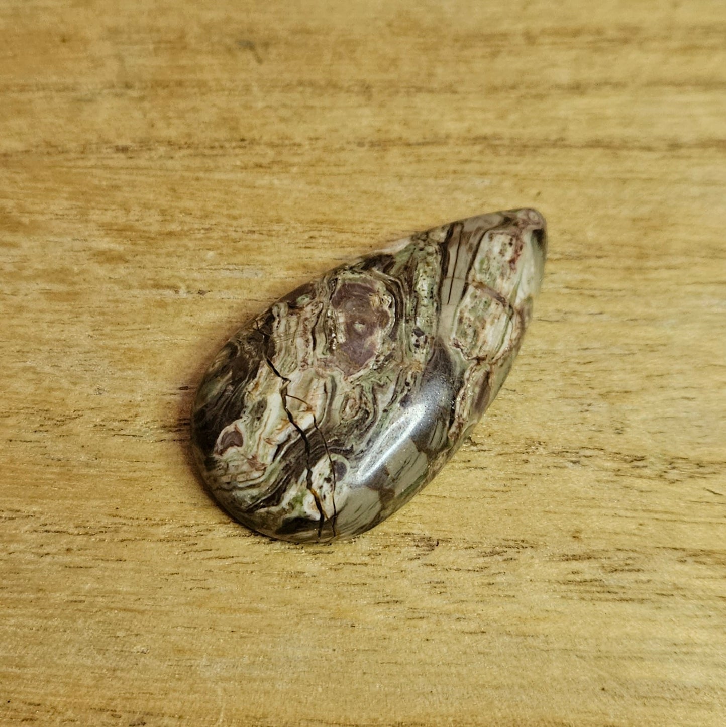 Rainforest Rhyolite Tear-drop Cabochon.