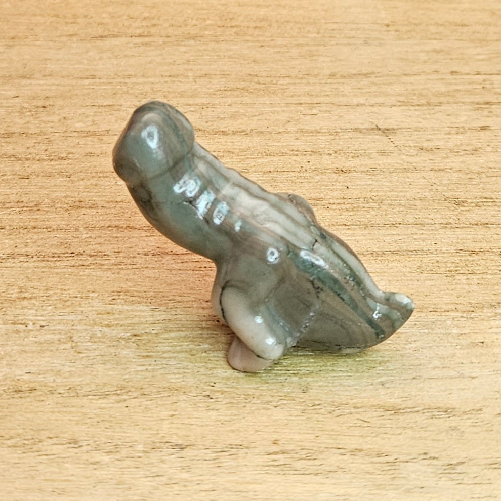 Dickhead Dinosaur Carving. *Sold Separately*