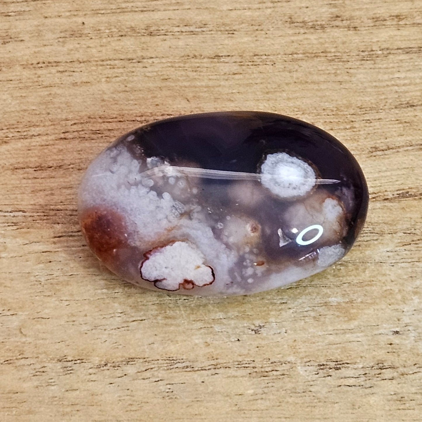 Black Flower Agate Palmstone.