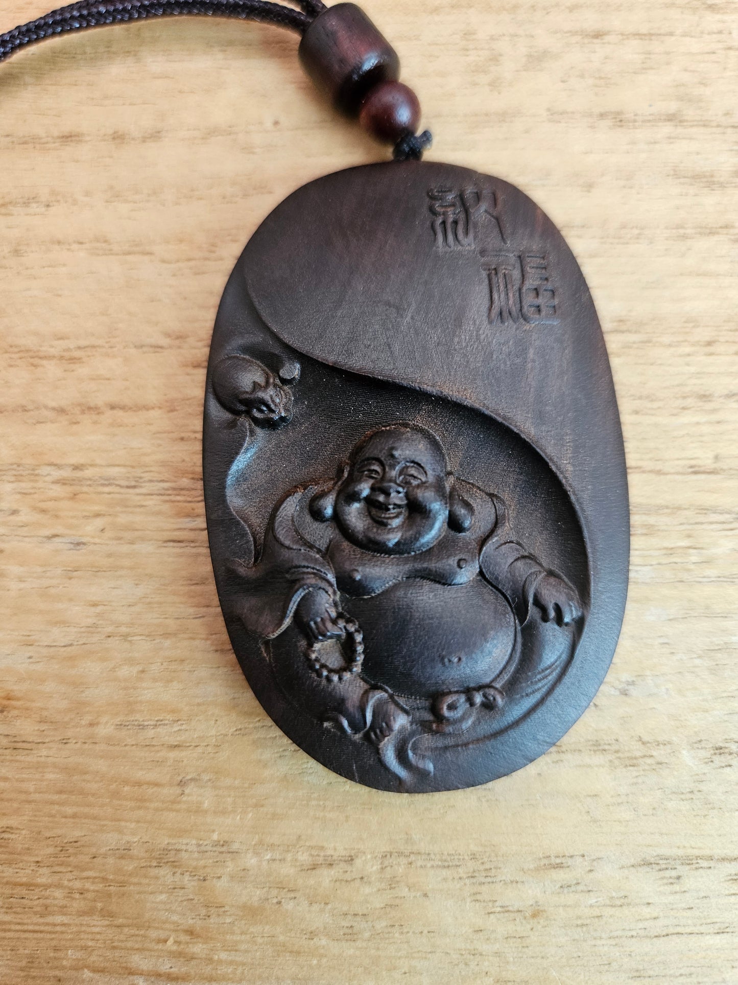 Wooden Buddha Pendant and Cord Necklace.