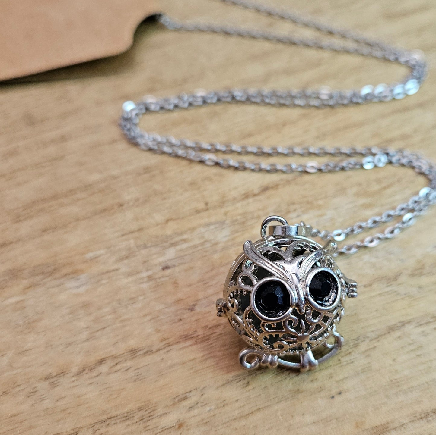 Owl Cage Necklace & Fluorite Sphere.