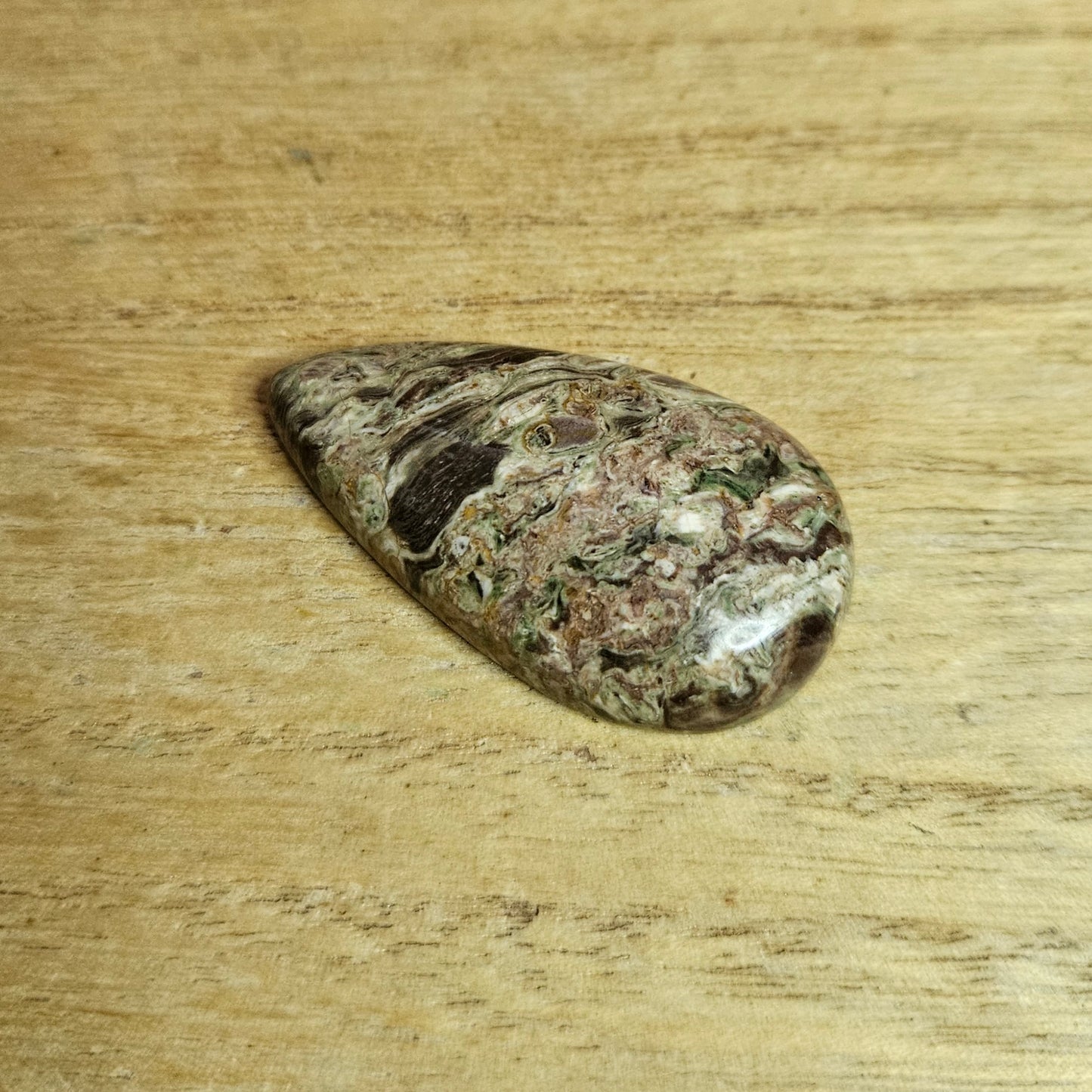 Rainforest Rhyolite Tear-drop Cabochon.