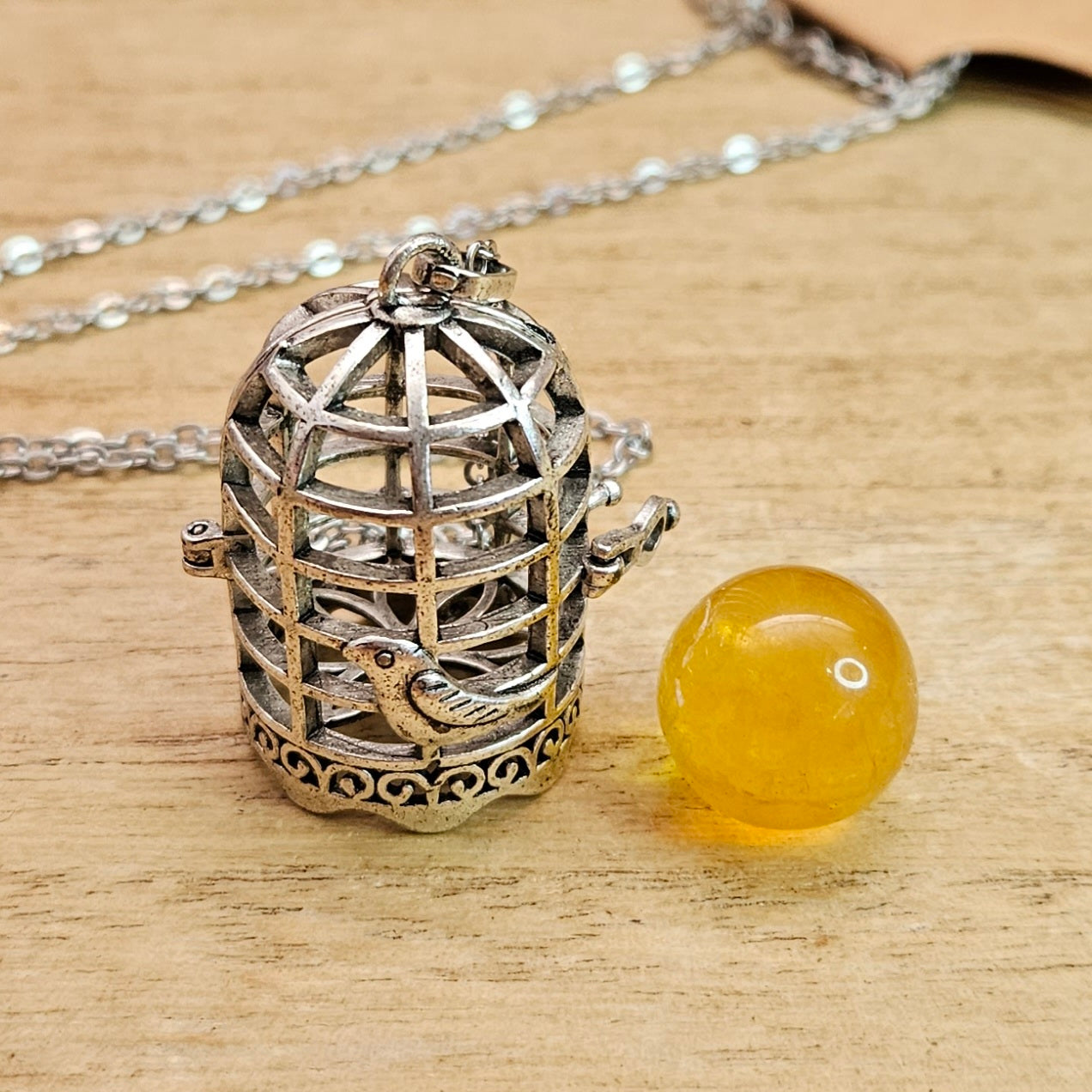 Bird Cage Necklace & Fluorite Sphere.