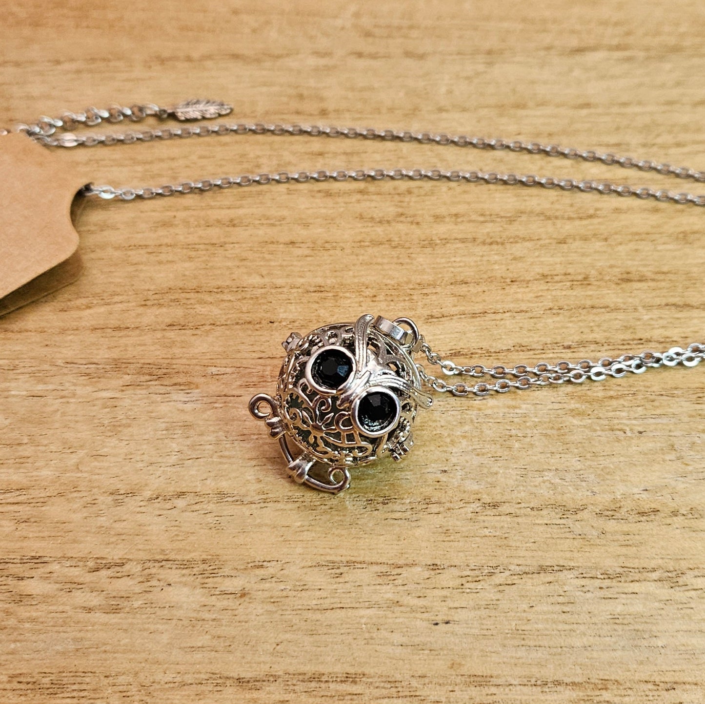 Owl Cage Necklace & Fluorite Sphere.