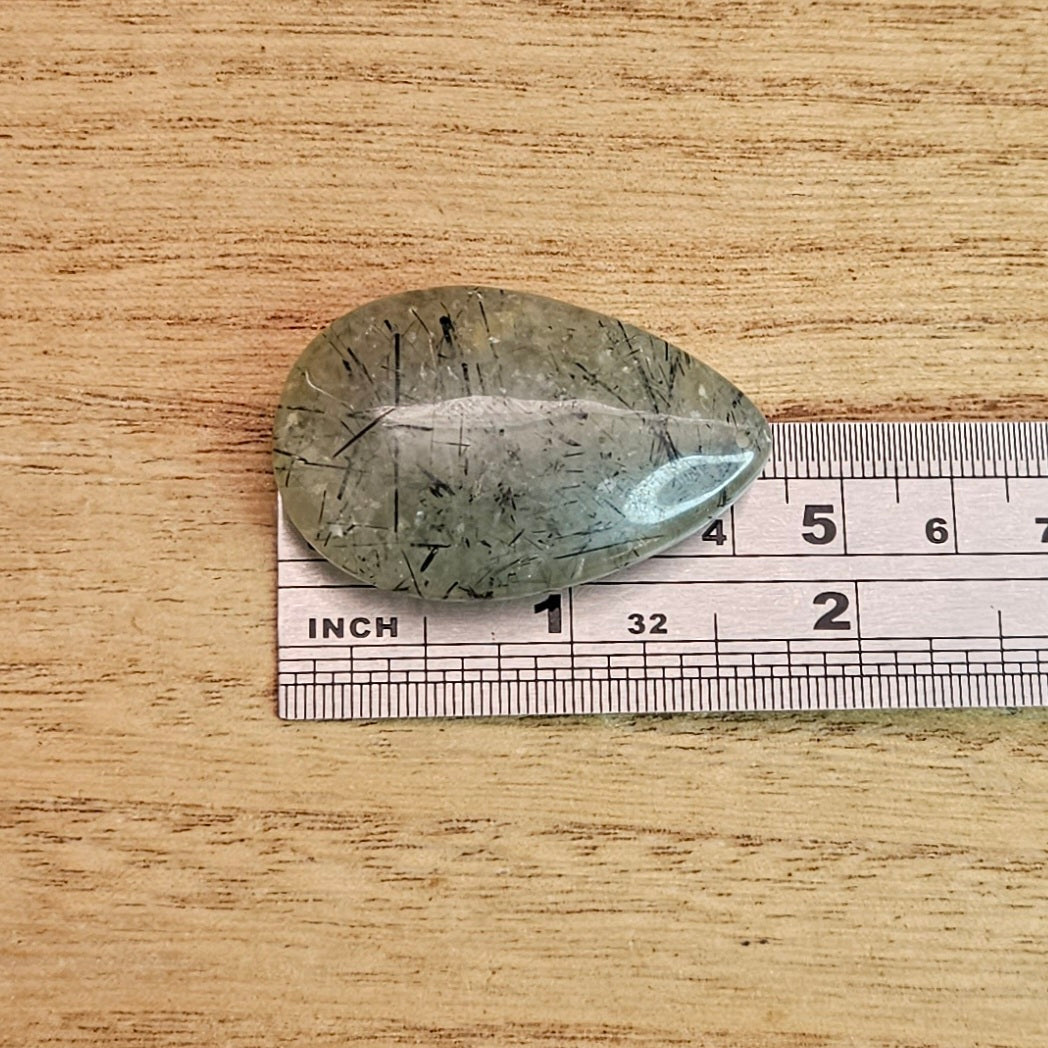 Epidote in Prehnite Tear-drop Cabochon.