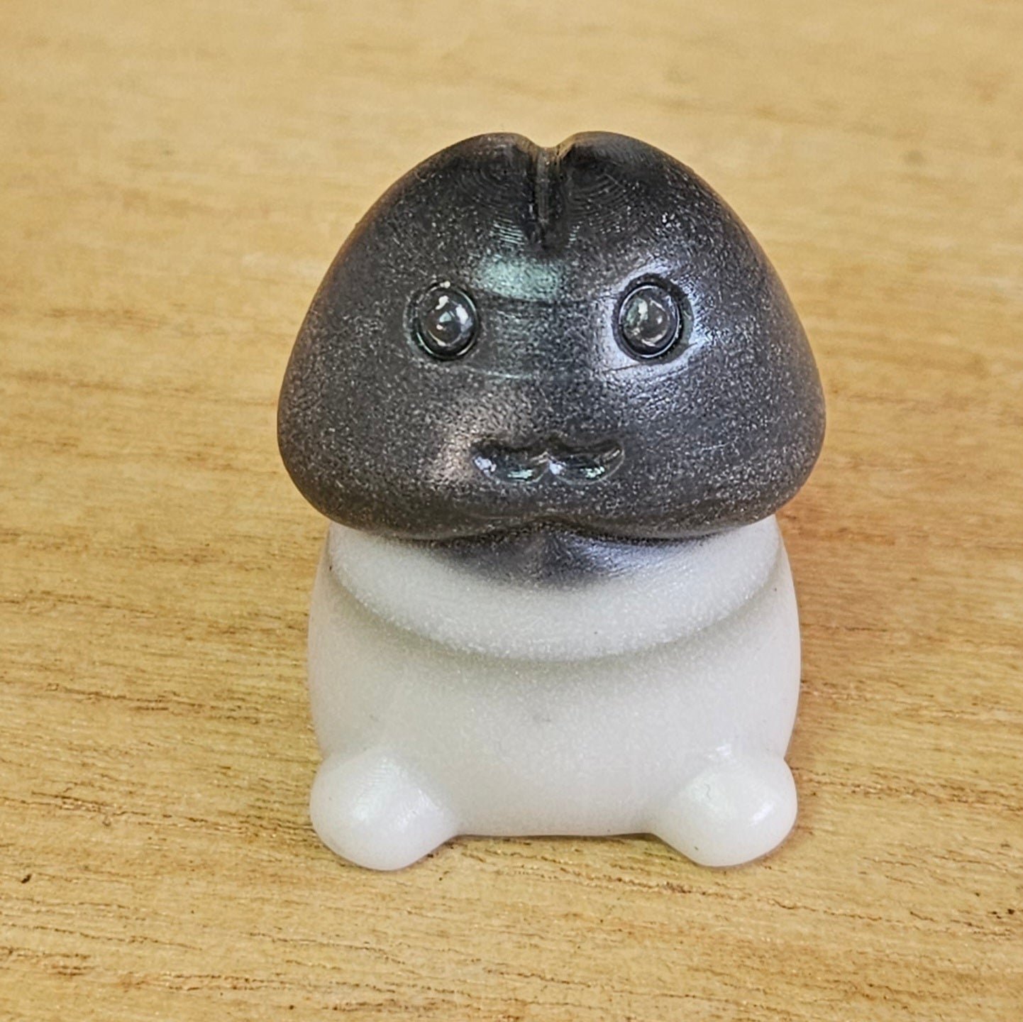 Taiji Jade Happy Ding Ding Carving.