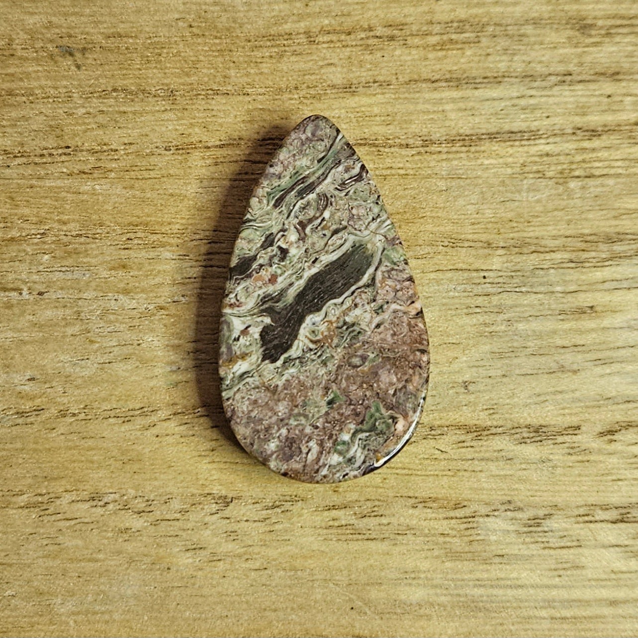 Rainforest Rhyolite Tear-drop Cabochon.