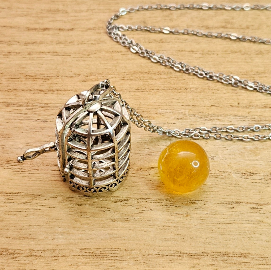 Bird Cage Necklace & Fluorite Sphere.
