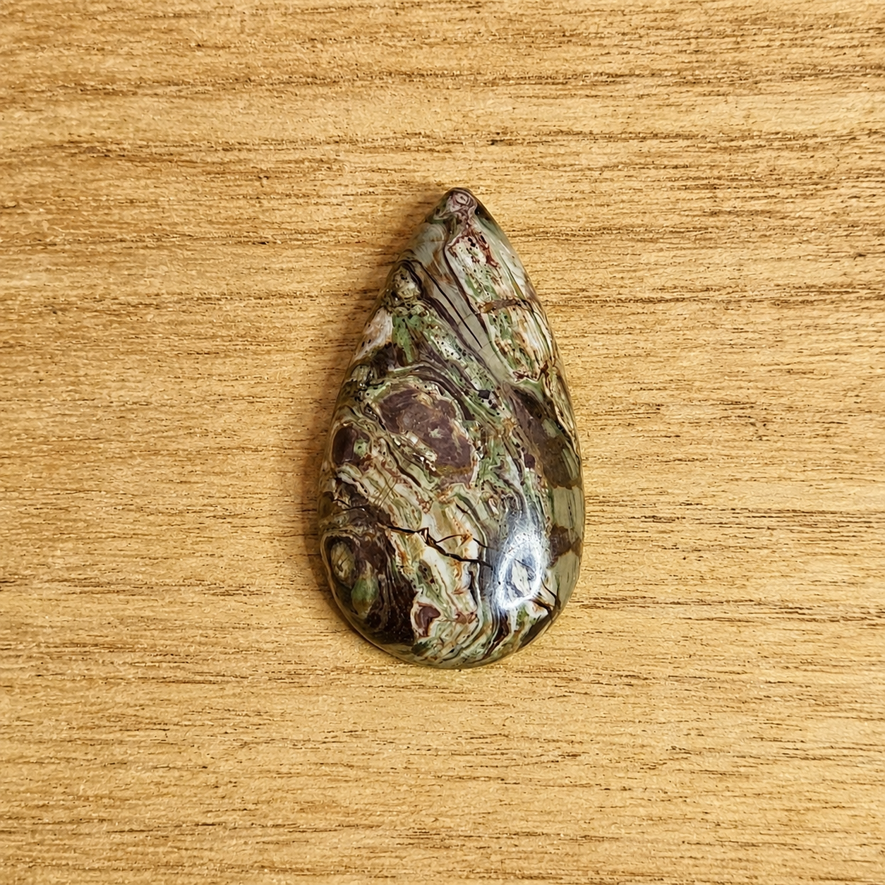 Rainforest Rhyolite Tear-drop Cabochon.