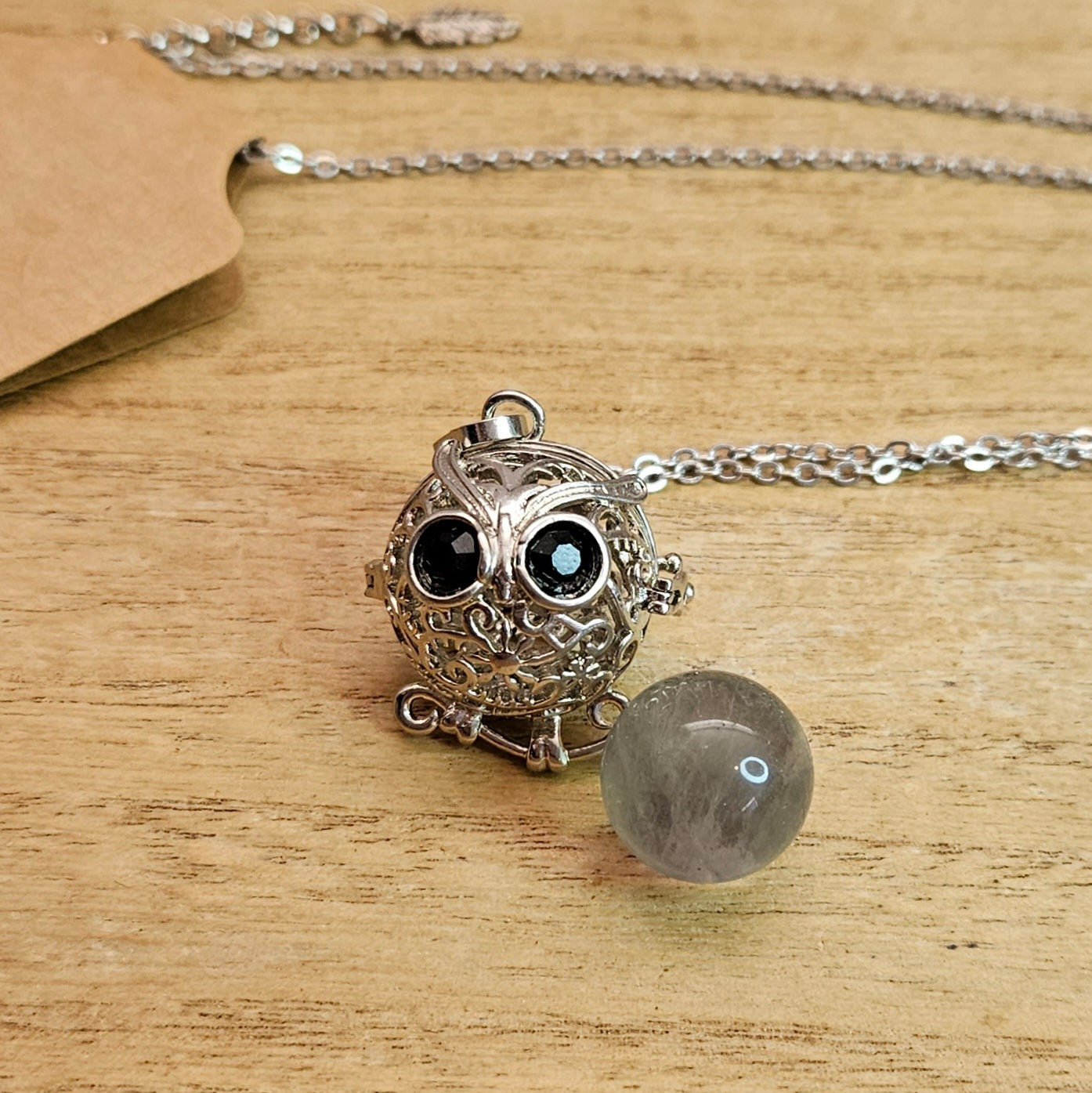 Owl Cage Necklace & Fluorite Sphere.