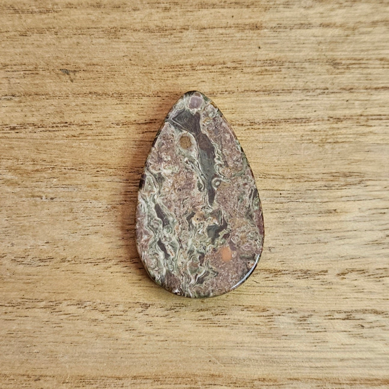 Rainforest Rhyolite Tear-drop Cabochon.